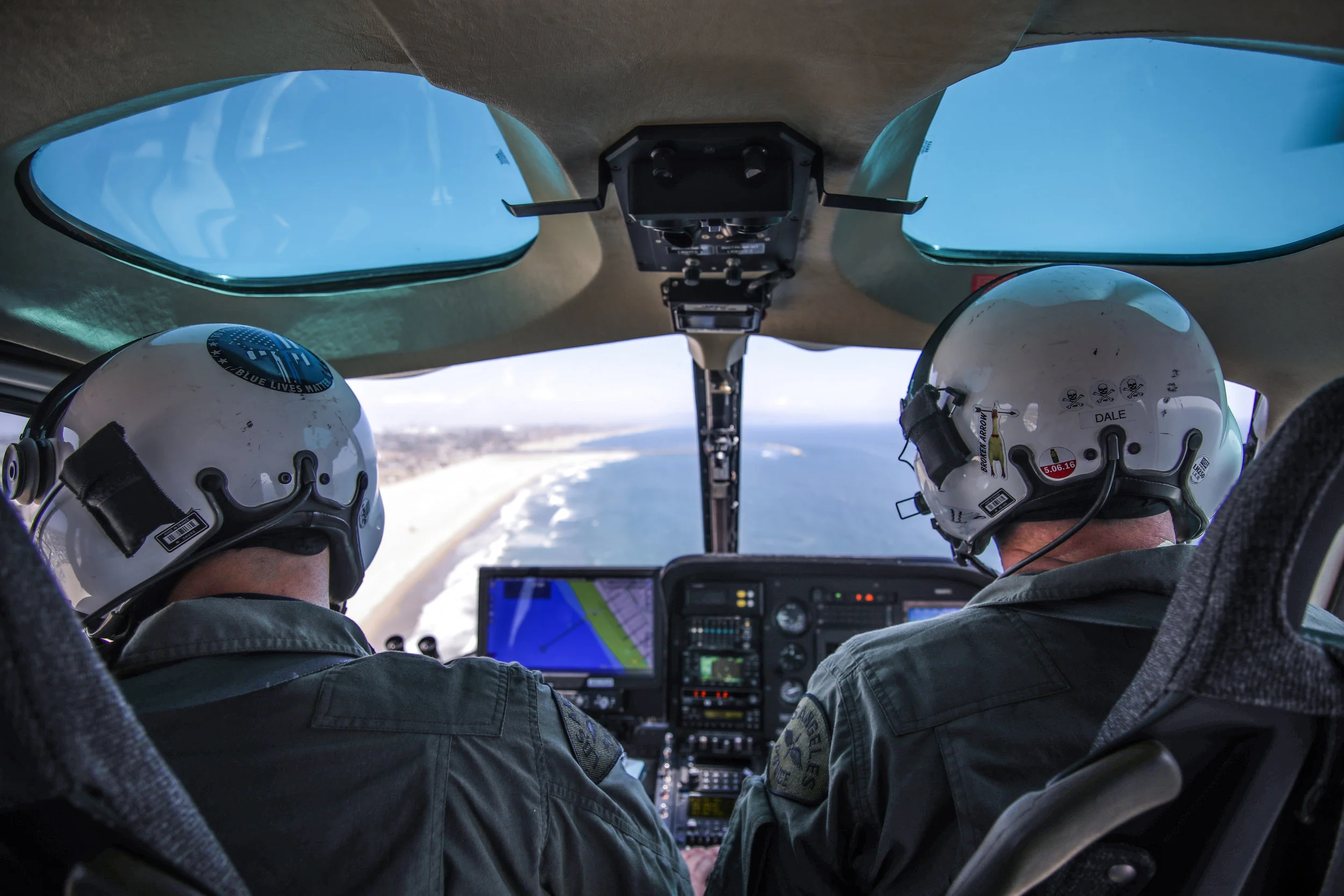 Michael Watkins/ Courier Tactical Flight Officer Rasool and Dale fly “Air 3” down the pacific coast highway on May 32, 2018 in Los Angeles Calif.