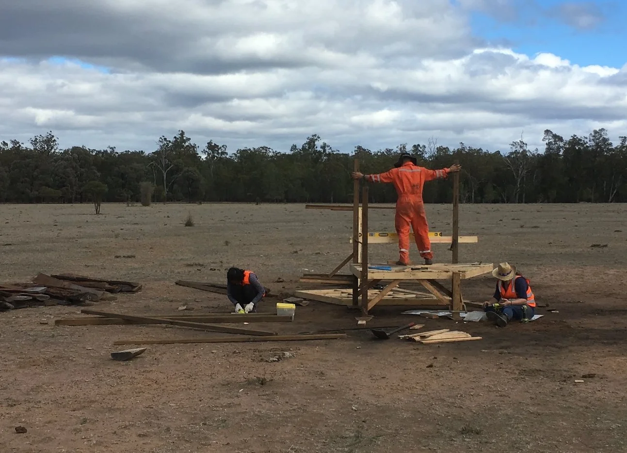 10am: Jorja levels platform two. Behind, number three lies on its side, assembled and ready to be placed.