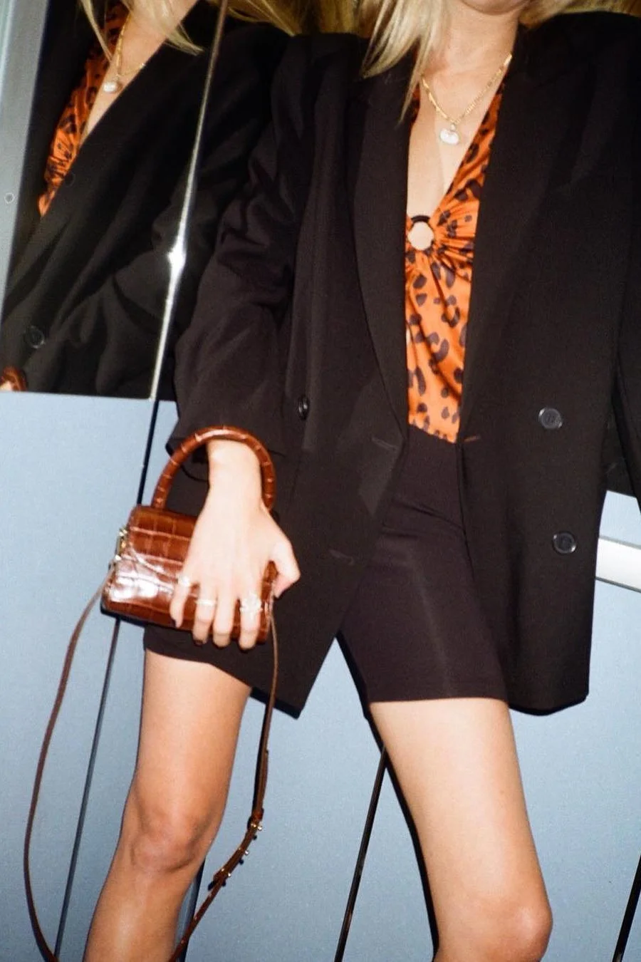 Camille Charriere in by FAR Mini Tan Croco Embossed Leather Bag