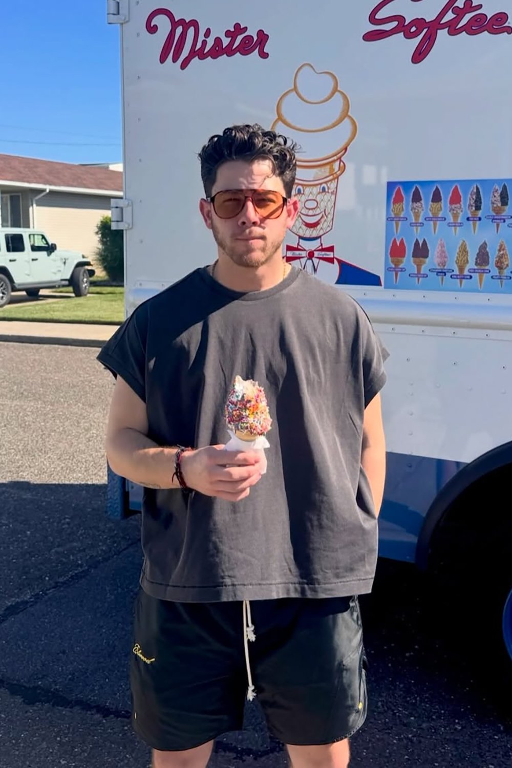 Nick Jonas in Le Specs Tragic Magic Sunglasses - Toffee Tort