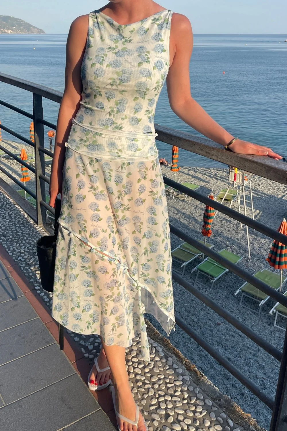 @courtneyroseking in House of Sunny Hydrangea Asymmetric Mesh Skirt