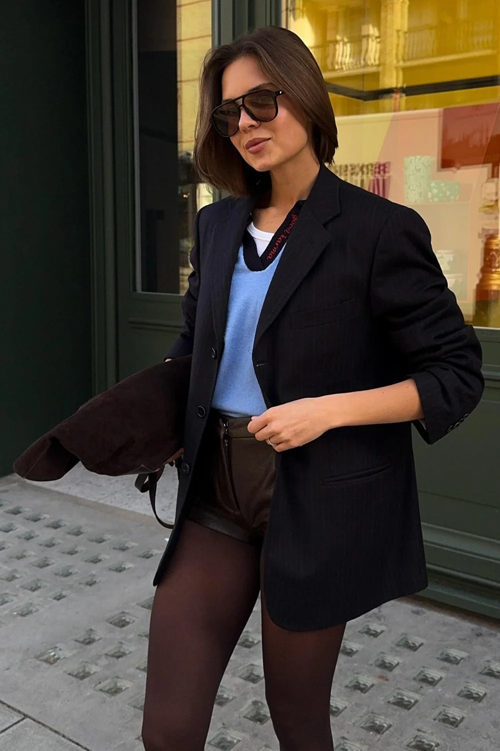 @sonilobodiuk in Le Specs Tragic Magic Sunglasses - Black - Tan Tint