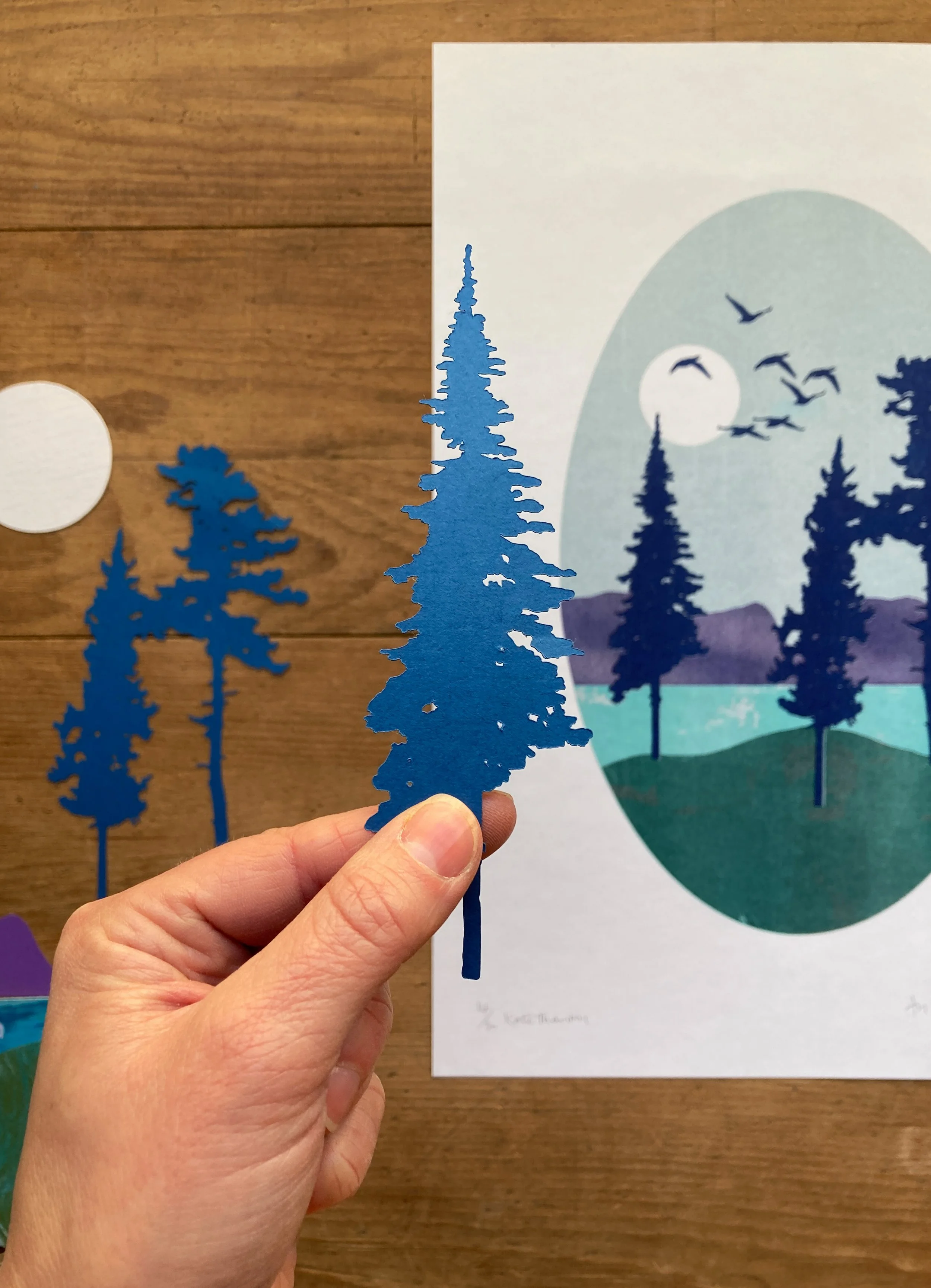 A five colour riso print of a view from Anglesey to Snowdonia. Limited edition of 40