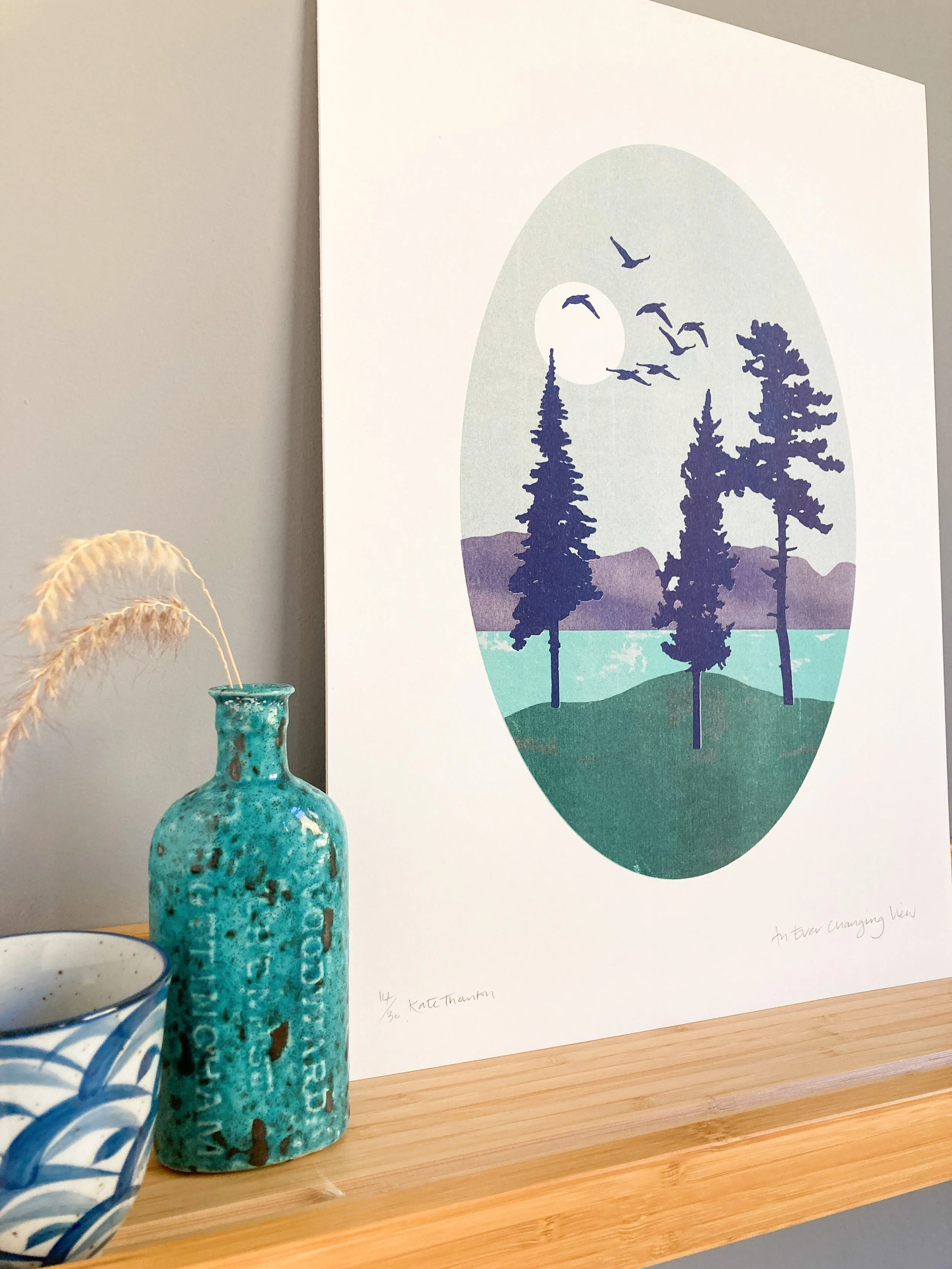 A five colour riso print of a view from Anglesey to Snowdonia. Limited edition of 40