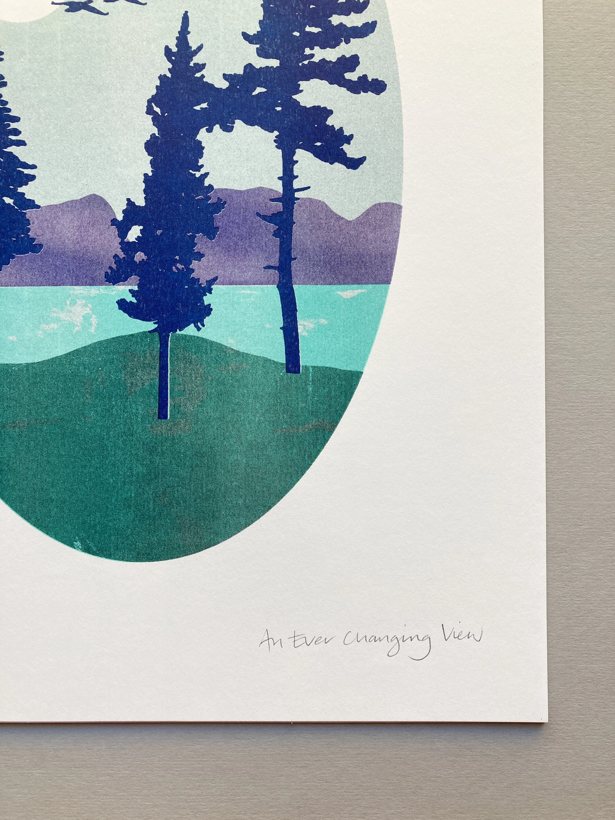 A five colour riso print of a view from Anglesey to Snowdonia. Limited edition of 40