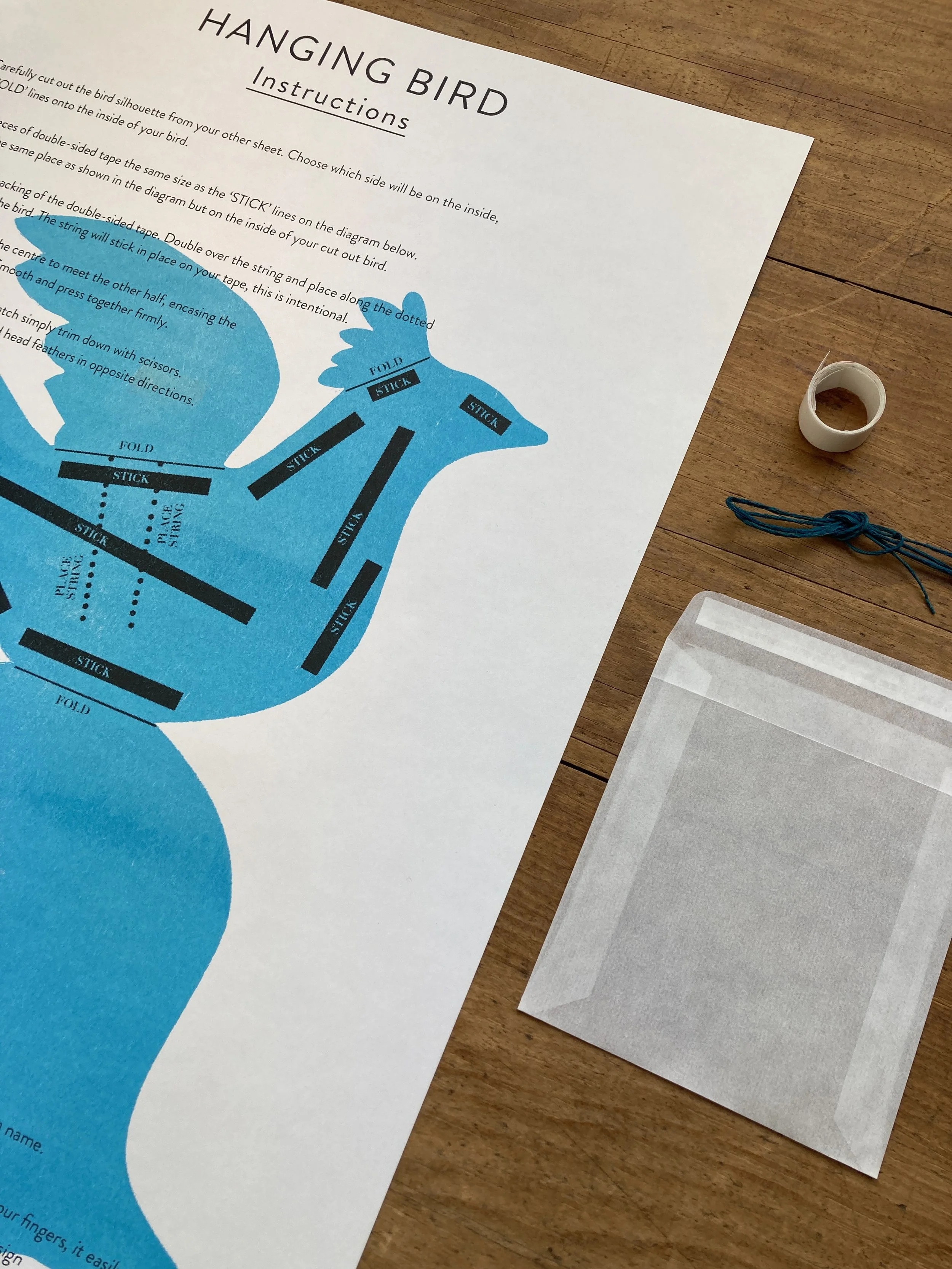 Paper Hanging Bird Kit - Riso Printed. Kit includes everything to make a 3D bird to hang up.