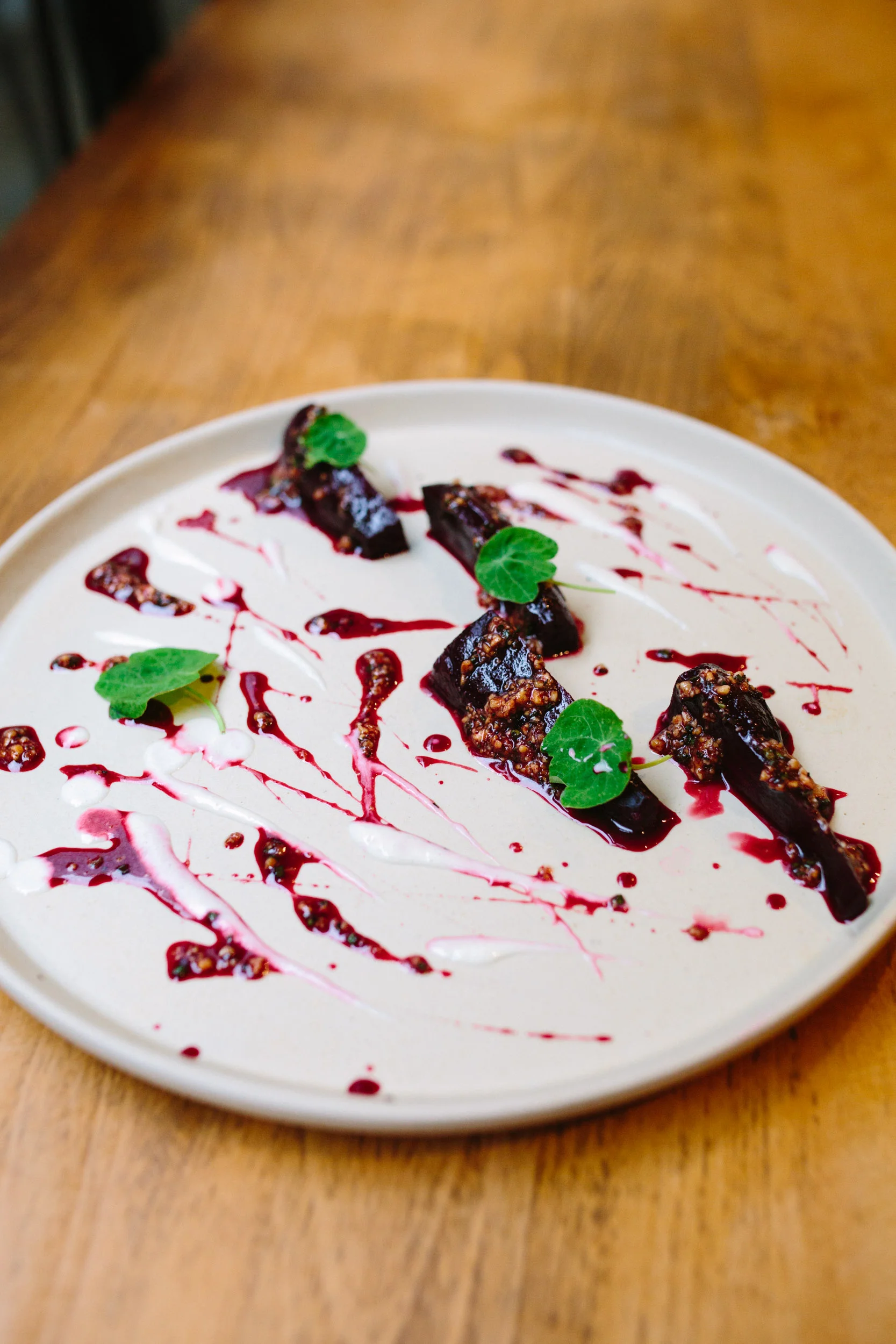 Barbecued beets, grains. goat's cheese