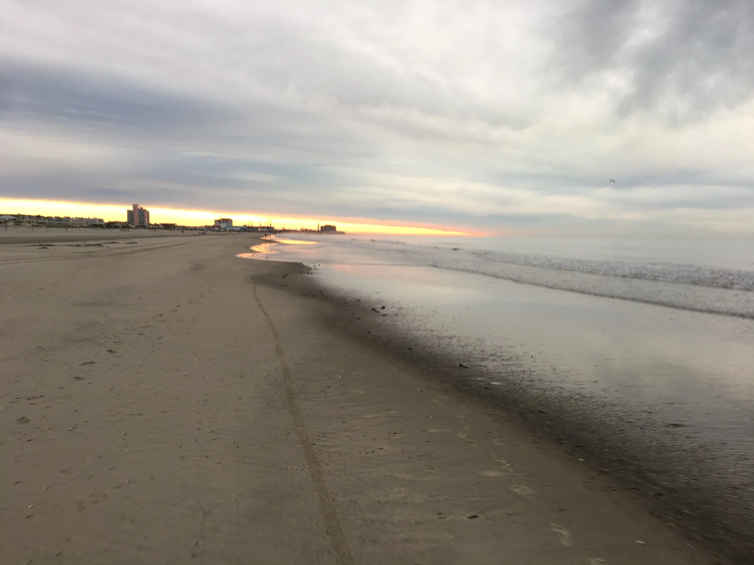 CloudsBeachSunrise.JPG