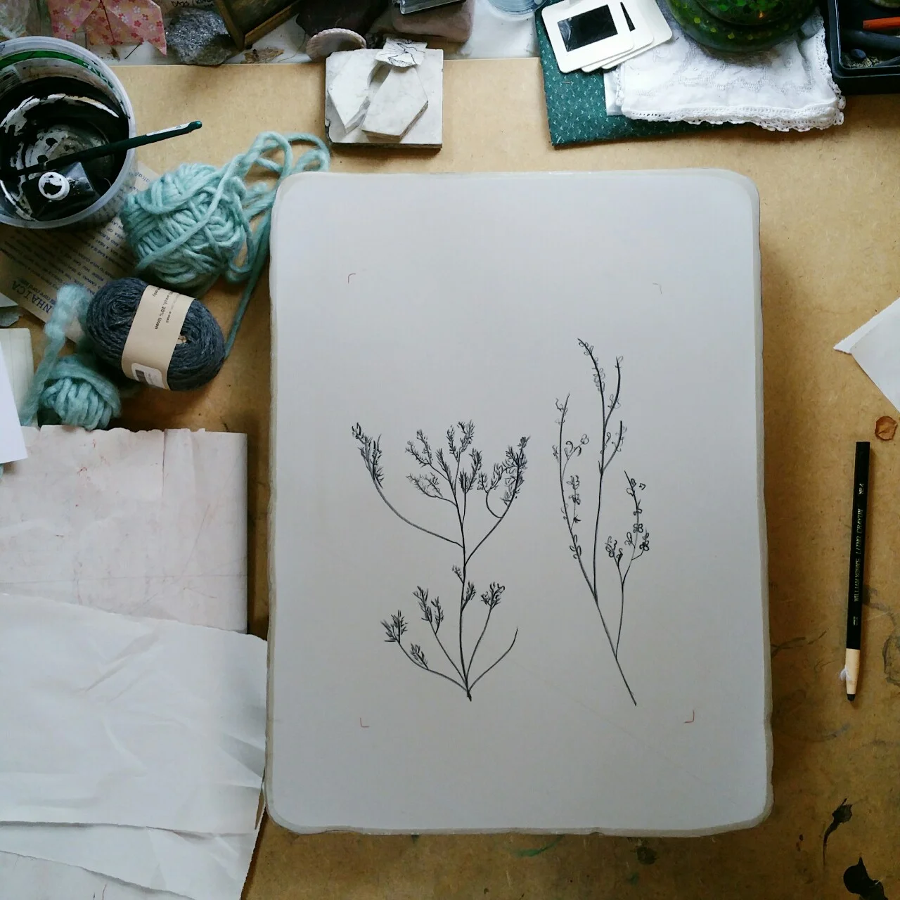 sketch in progress on the stone