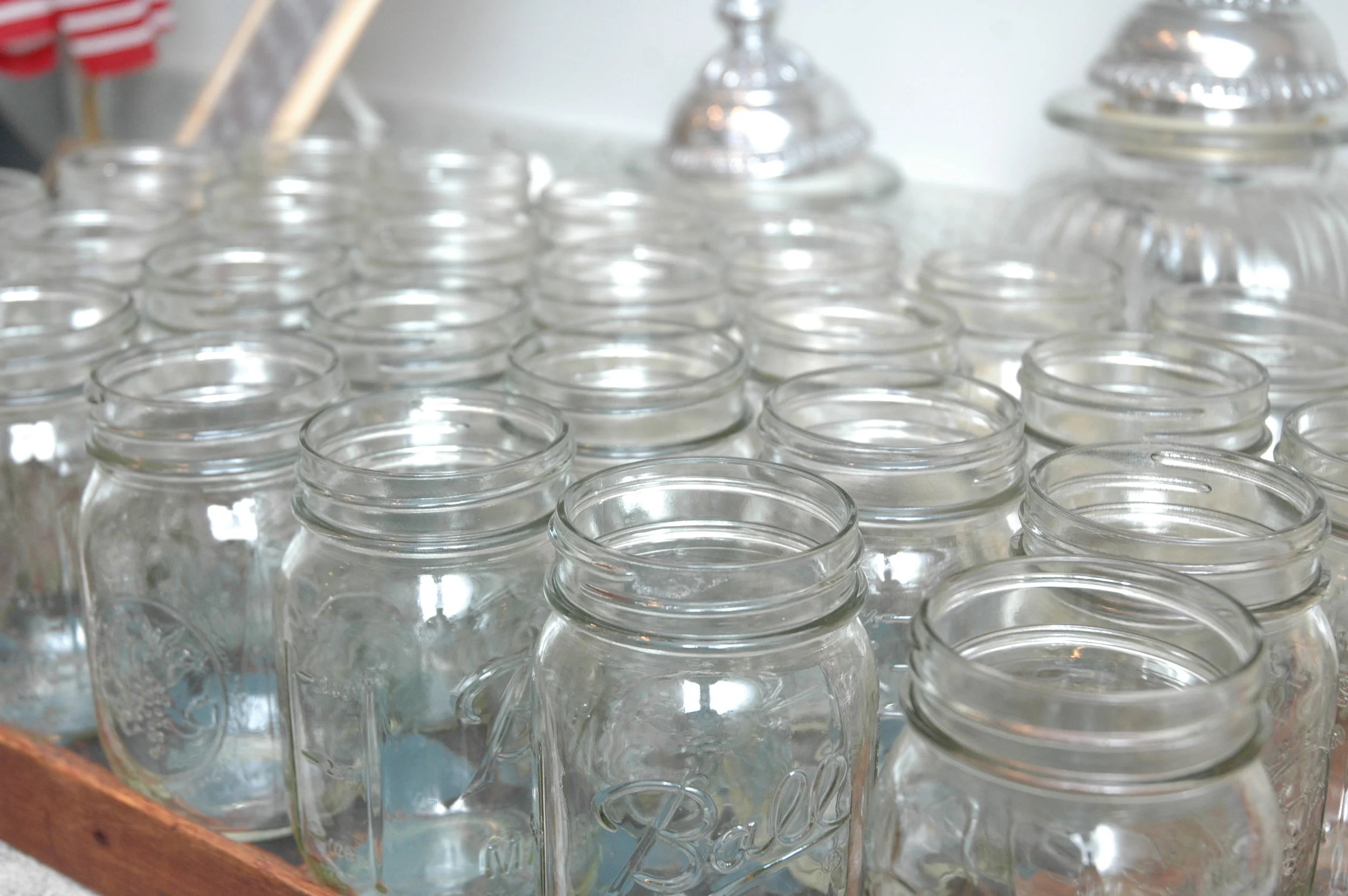 Nothing more American country than drinking of of Ball-Mason jars in the summer. They're on an antique checkerboard tray.