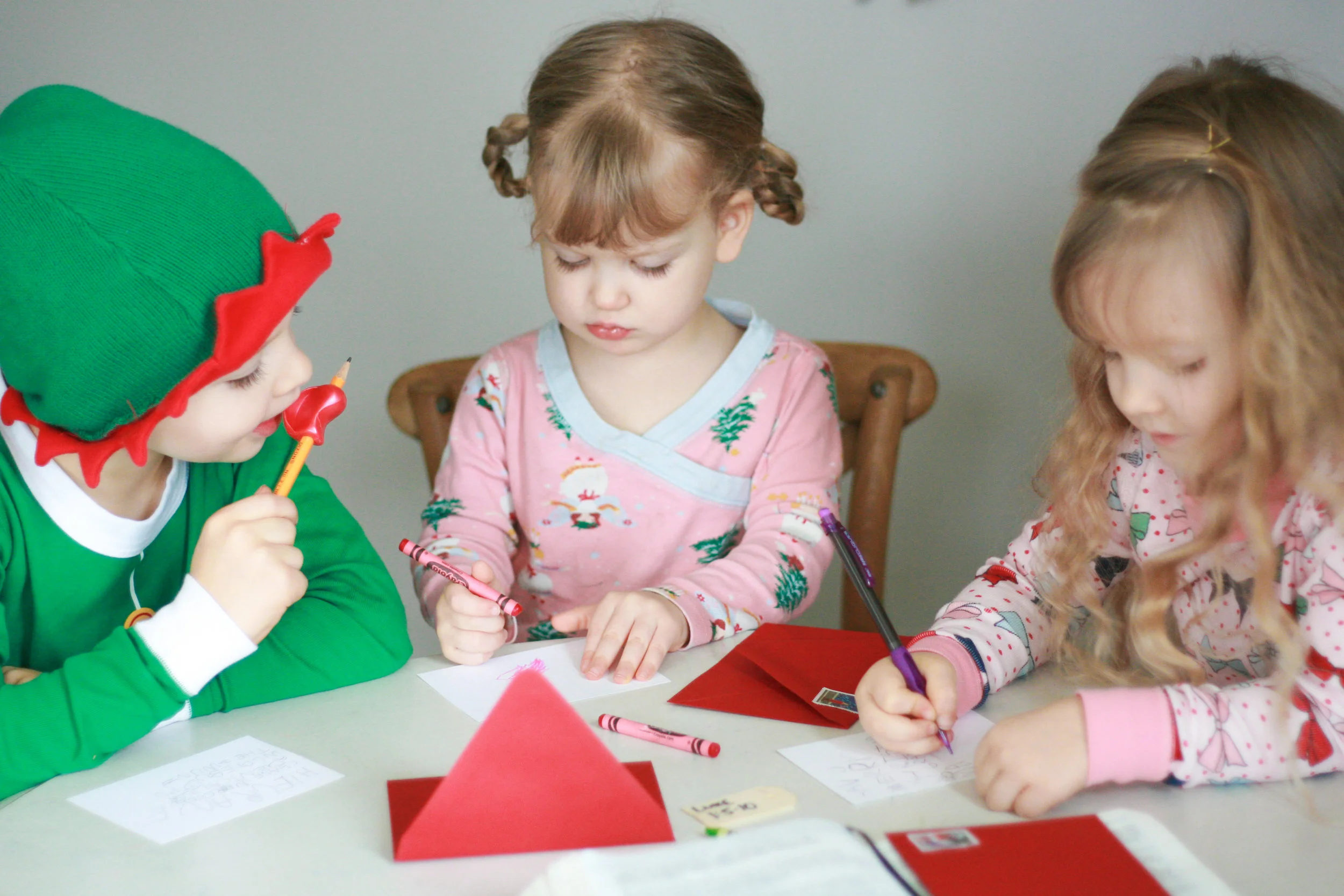 The oldest three in 2016, writing letters to grandparents