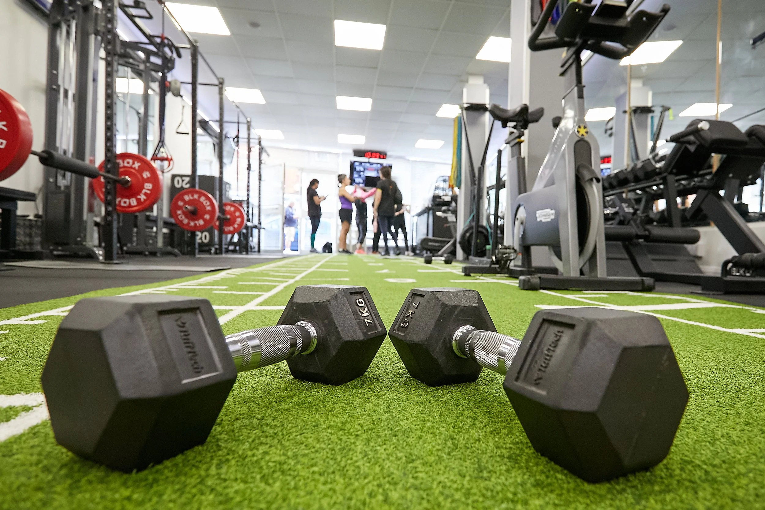 Geometric drawing of an outline square with sections divided by vertical, horizontal, and diagonal lines.