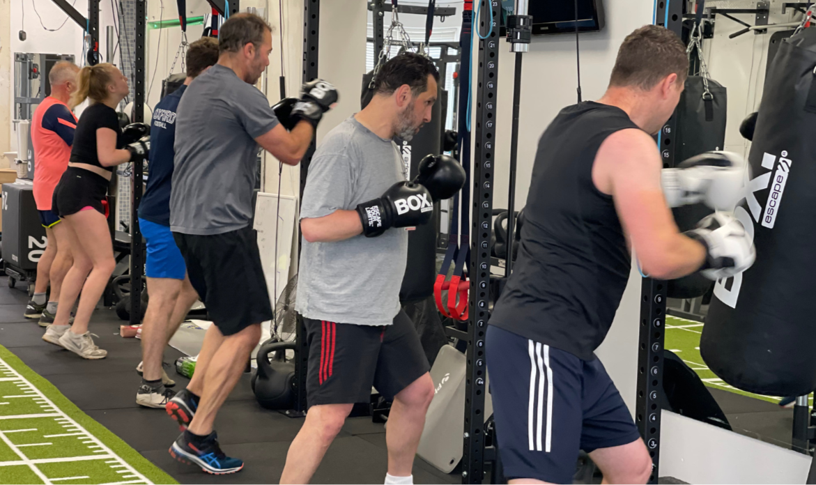 Geometric drawing of an outline square with sections divided by vertical, horizontal, and circle lines.