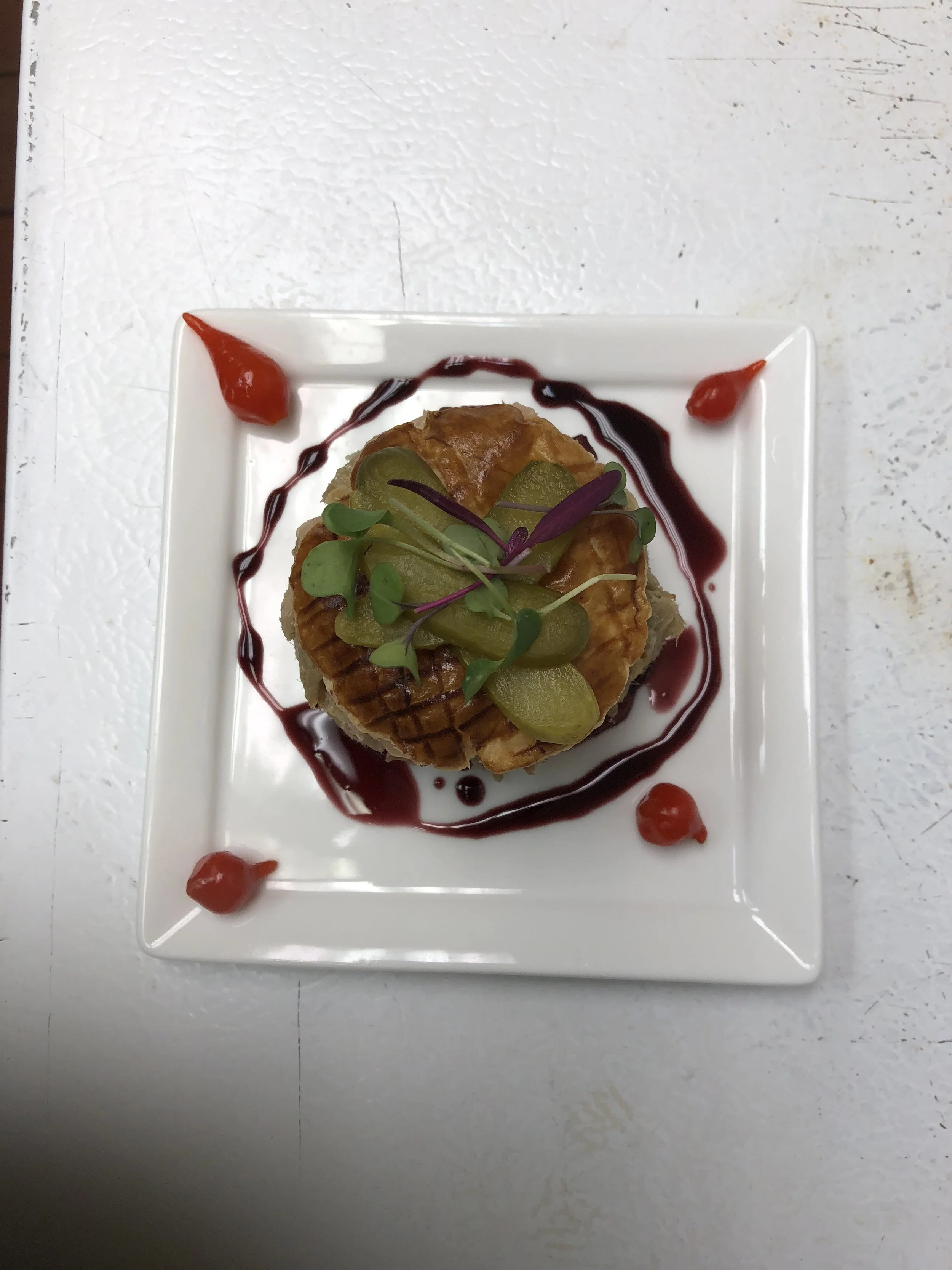 Homemade Paté, crispy flaky dough and beet, cranberry, strawberry, onion compote with a red wine vinegar glaze.