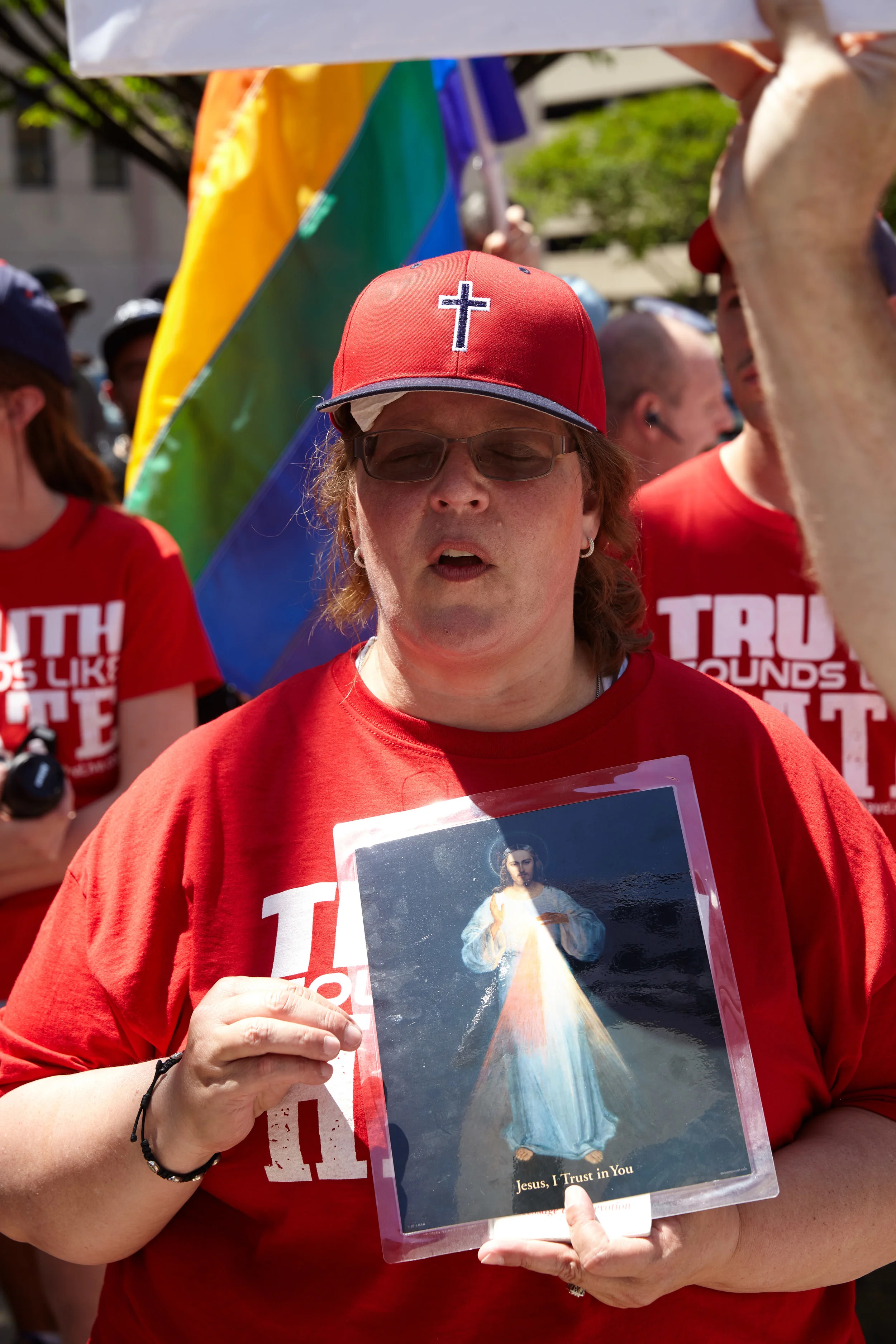 A counter protester next to the Big Gay Dance Party