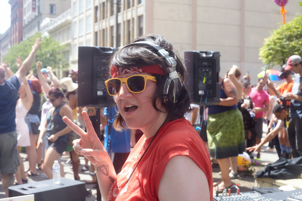 DJ Moxie plays music during the Big Gay Dance Party