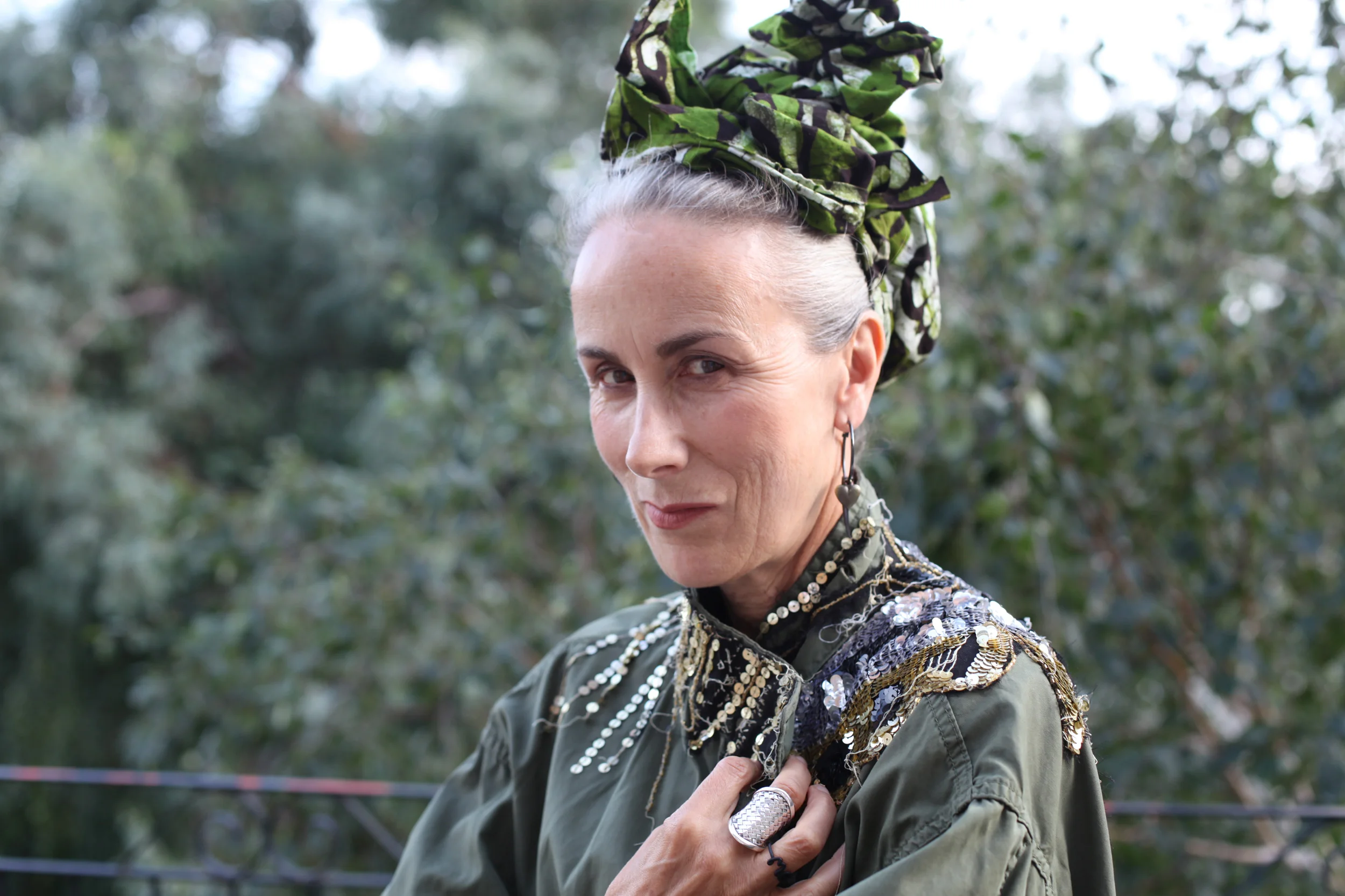 Caryn wears sequinned recycled parker by Reem Alasadi, Image by Mateda Franklin.