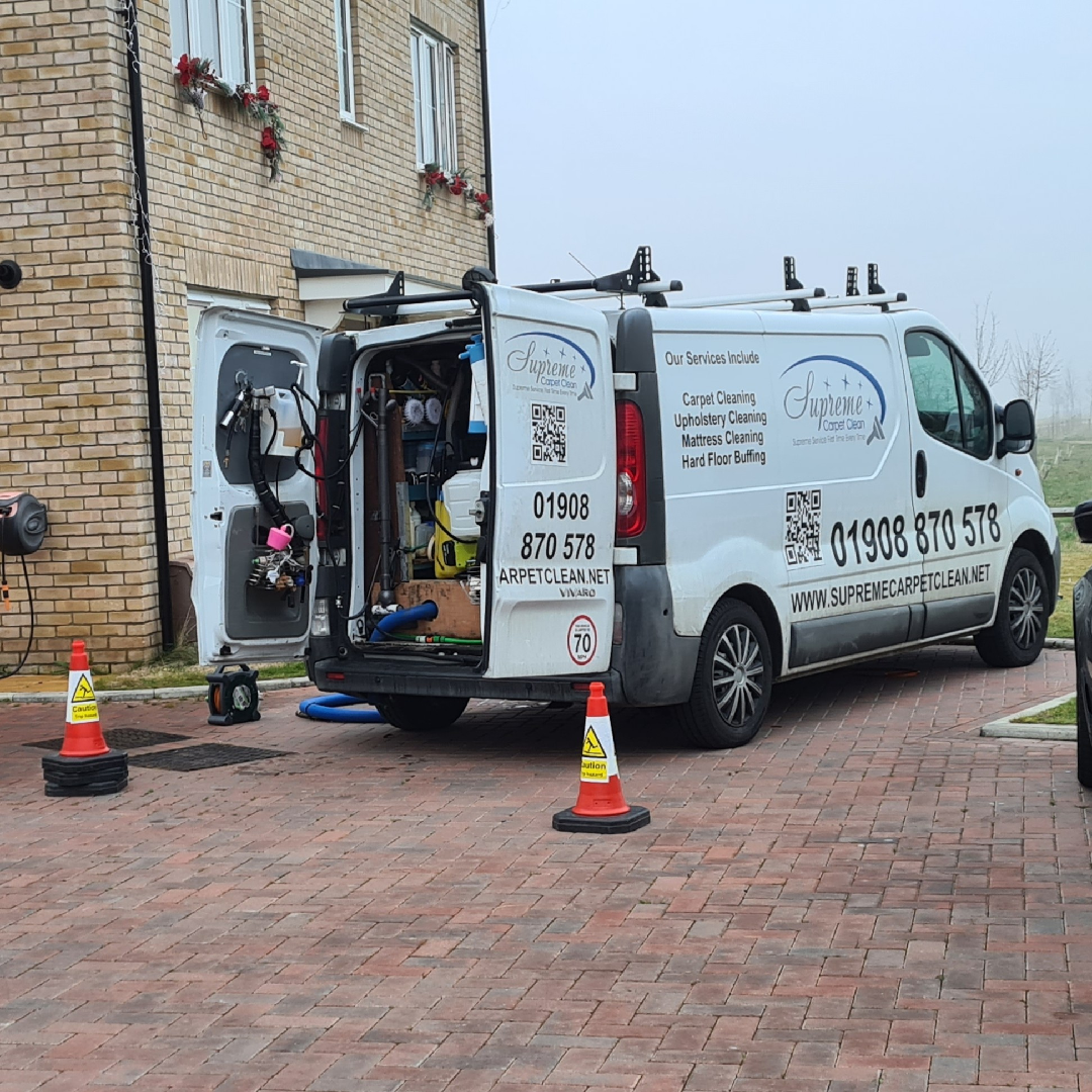 Supreme carpet clean van parked outside a property in Bedford