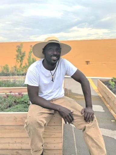 Mike on our rooftop farm in Denver, Larimer Uprooted