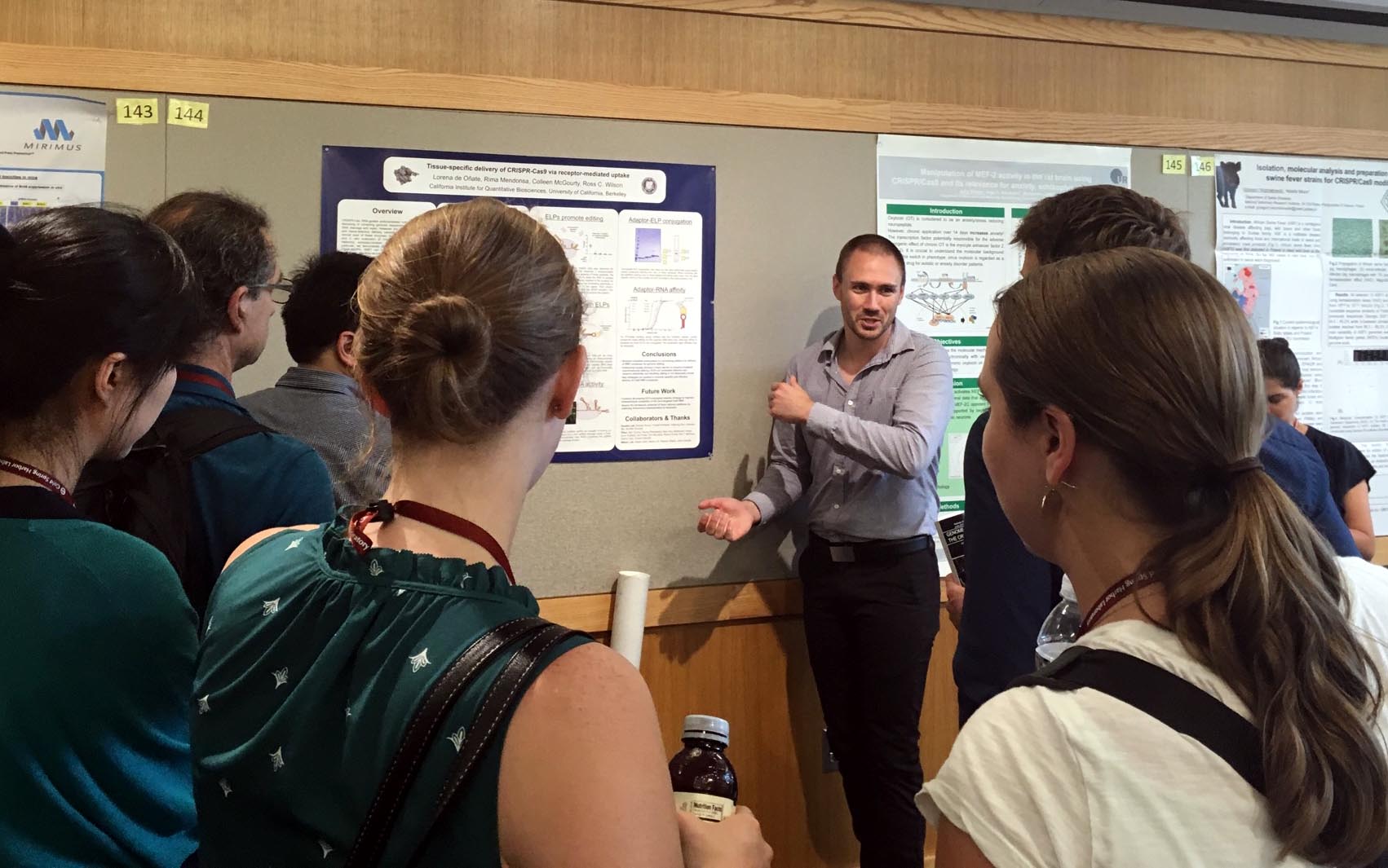  The poster session was scheduled dangerously soon after a lunchtime volleyball match, hence the overheating presenter.&nbsp; 