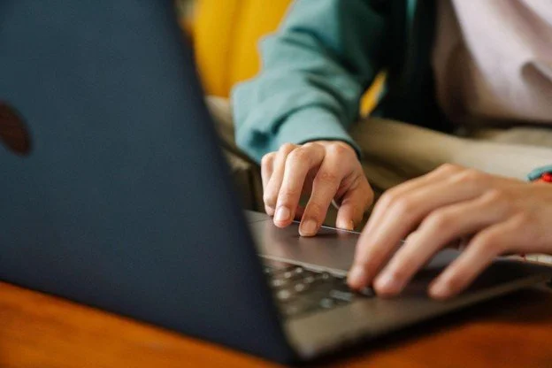 Typing on a Laptop | ProductiveandFree
