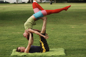  Partner yoga in the park 