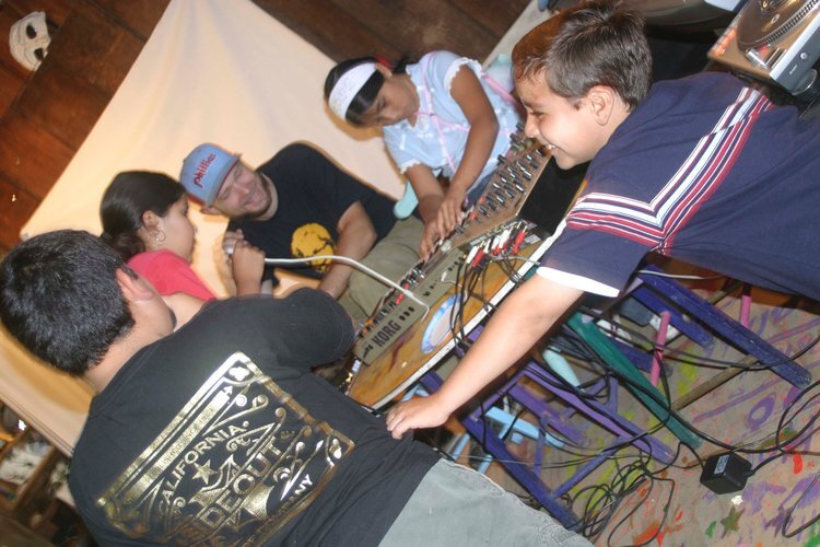  Kids making music playing with mixers 