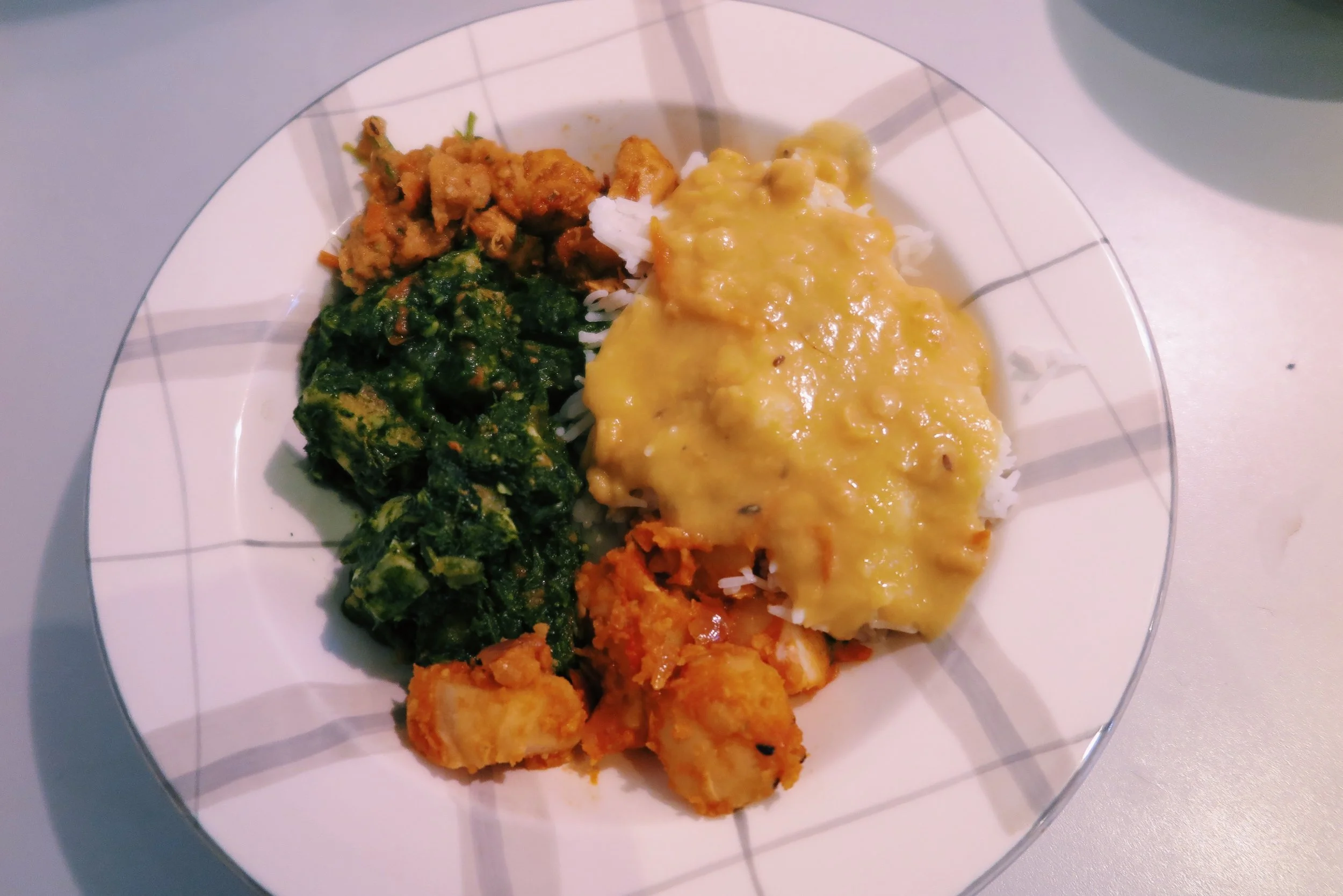 2. Nepalese dal bhat (rice + lentils) with palak paneer (cheese + spinach) + aloo (potato) + chicken breasts / Akash's mom made this hehe
