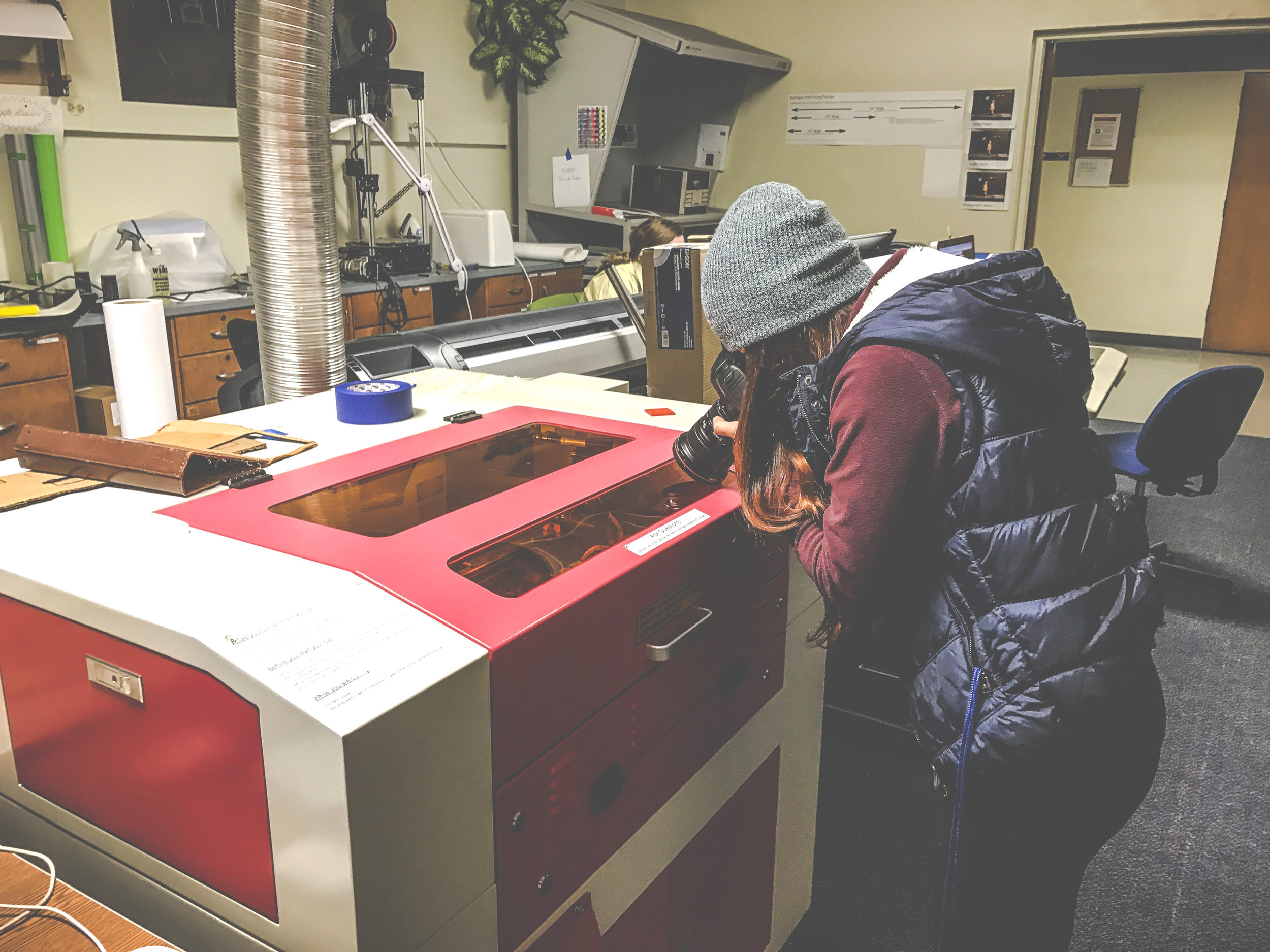 Photographing and Operating Laser Cutter at CSUEB Maker's Space Photograph: Alexander Deziga