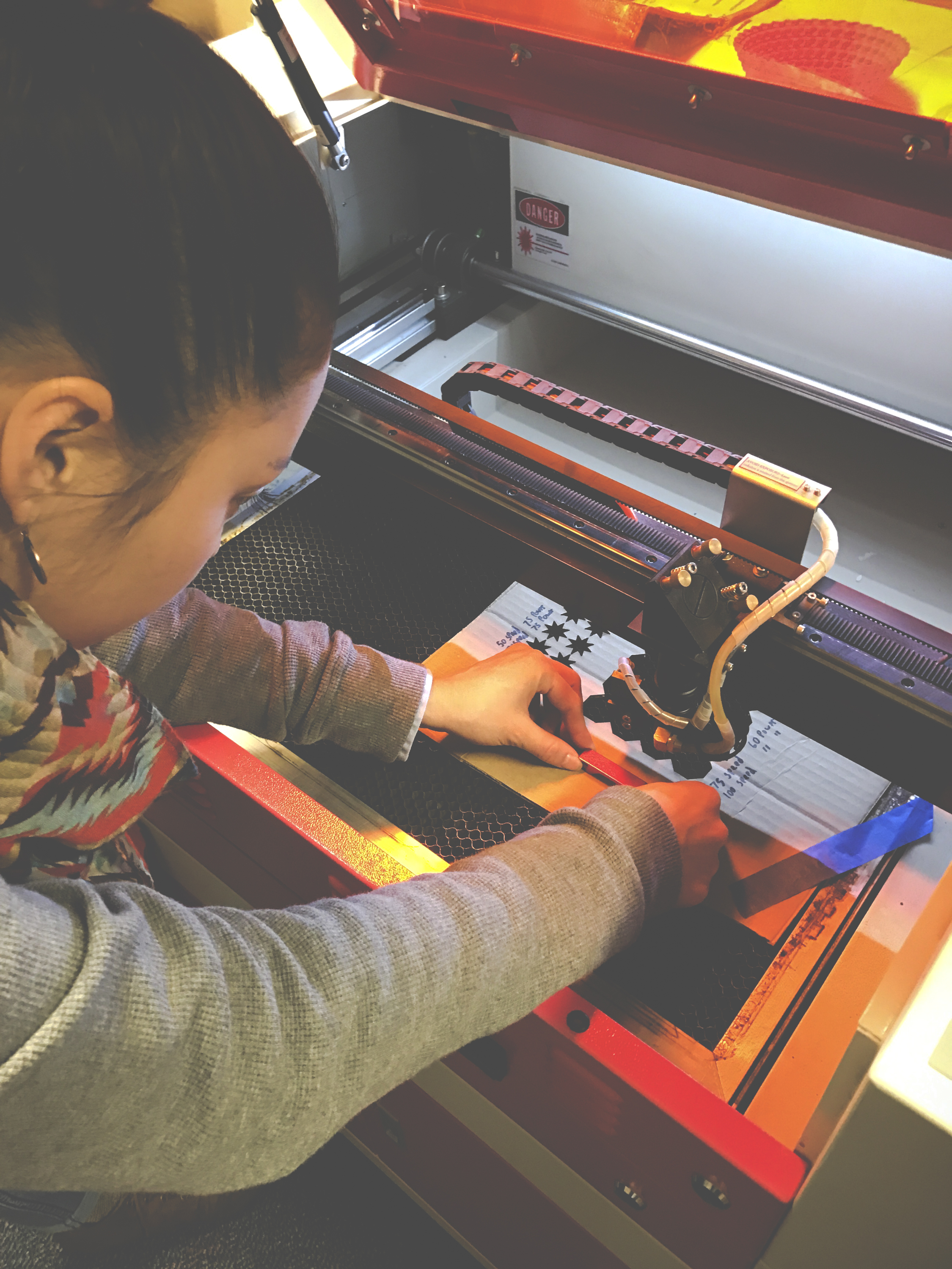 Laser Cutting Anodized Aluminum Keychain Photograph: Alexander Deziga