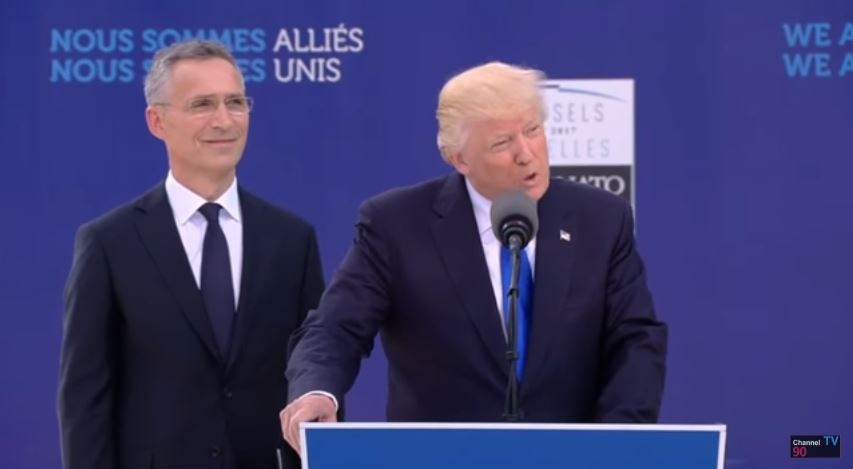 NATO Secretary General Jens Stoltenberg looks on as President Donald Trump addresses the heads of state of the alliance, May 25, 2017.