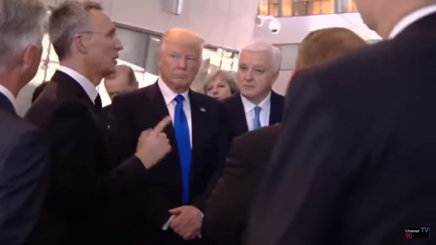NATO Secretary General Jens Stoltenberg, Donald Trump and Montenegro Prime Minister Dusko Markovic moments after Trump pushed his way in to get closer to the speaker.