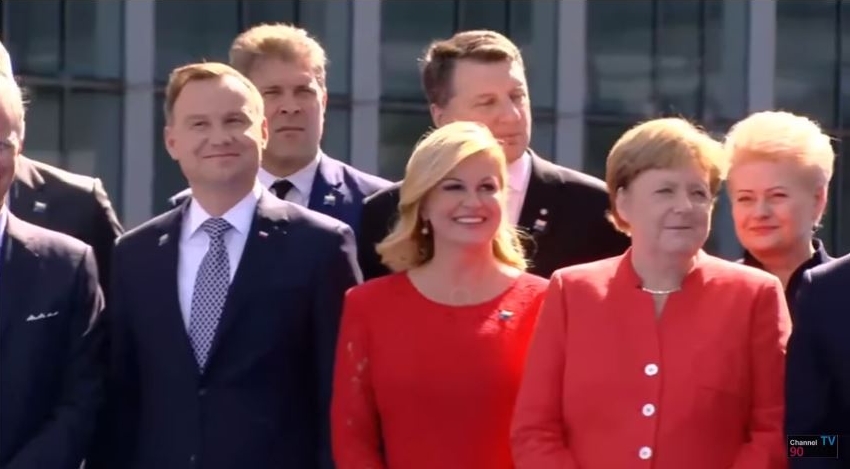 A screen grab moments after Trump's joke about NATO headquarters. Flanking Angela Merkel are Croatian President Kolinda Grabar-Kitarovic and Lithuanian President Dalia Grybauskaite.