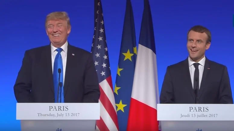 Behind white knuckles, Macron makes up his own mind