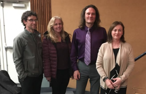 Jonathan Kruk and members of the School of Liberal Arts committee pose for a picture after the event.