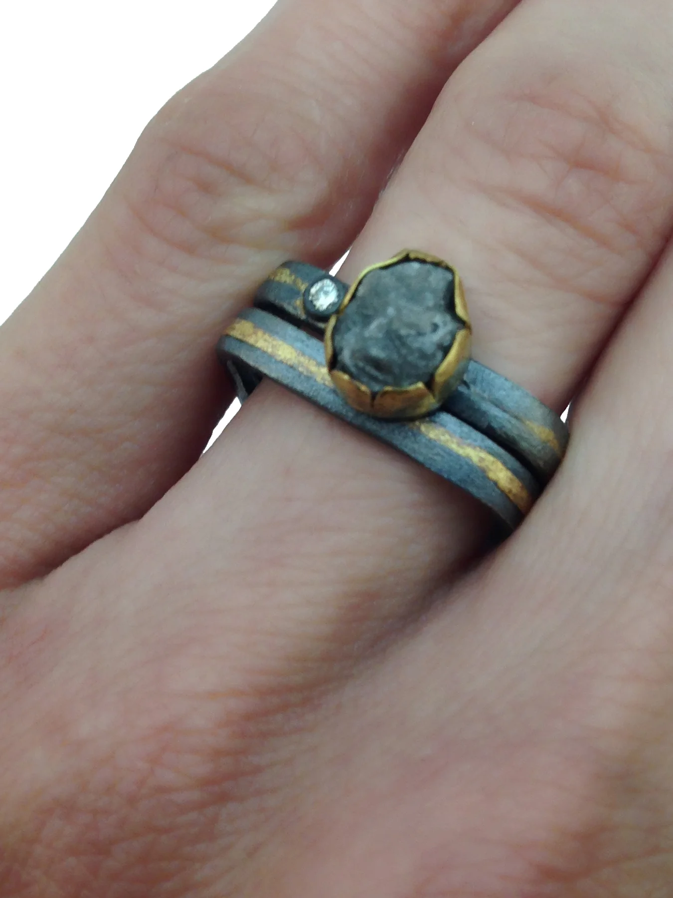 rough_diamond_ring_on_with_band.jpg