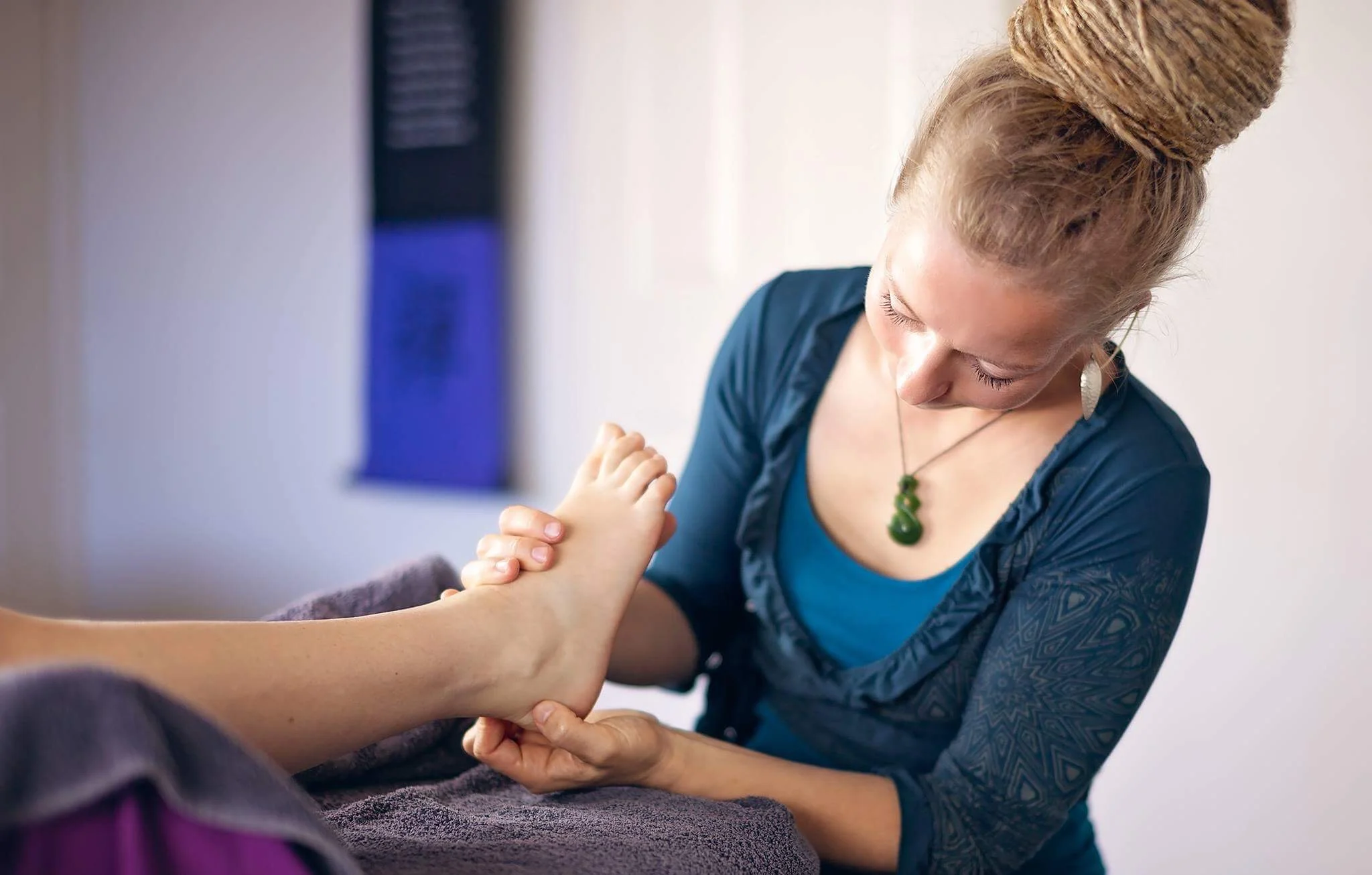 What are trapped emotions and how do they show up in your body and feet?