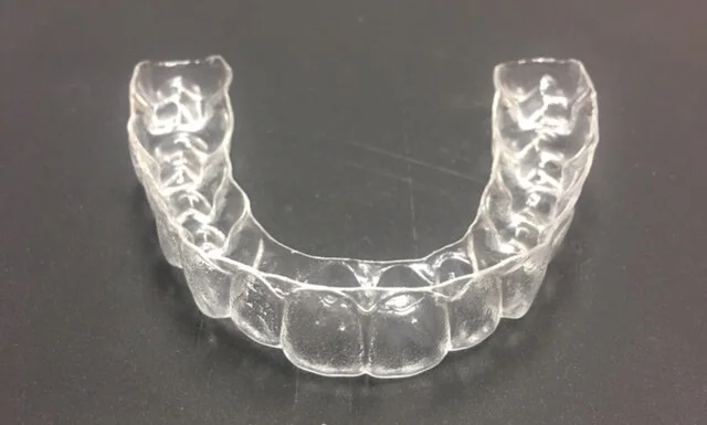 Example photo of a clear retainer made by Moore Orthodontics Lake Zurich Illinois