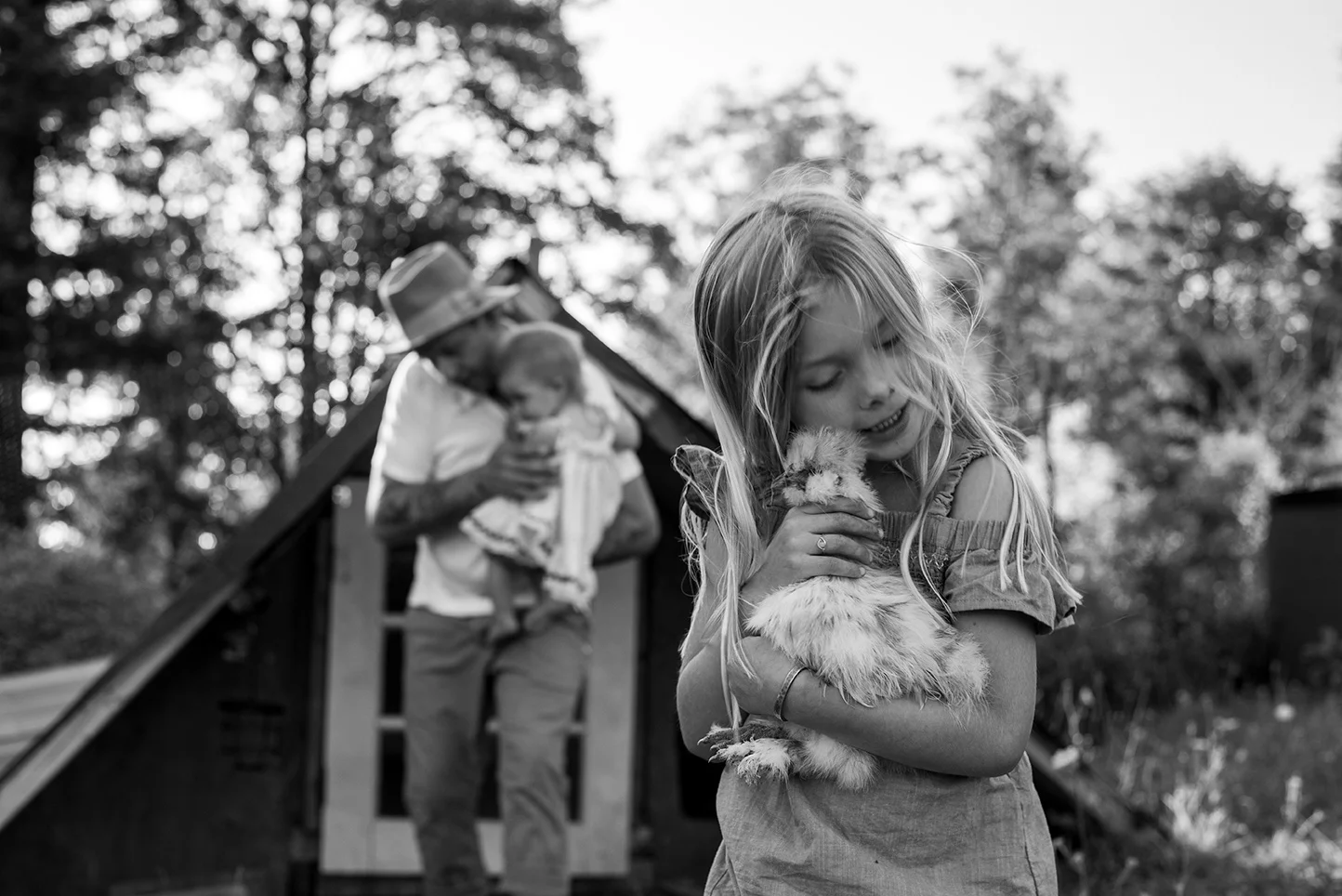 Family laughing in Kalama, Washington, at their home farm, photographed by Vancouver photographer Lillian Short.