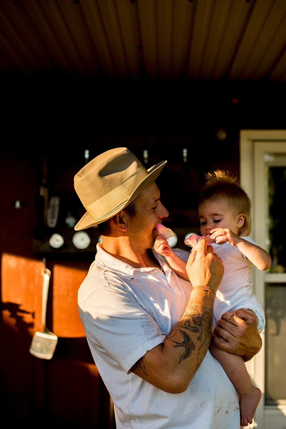 Family laughing in Kalama, Washington, at their home farm, photographed by Vancouver photographer Lillian Short.