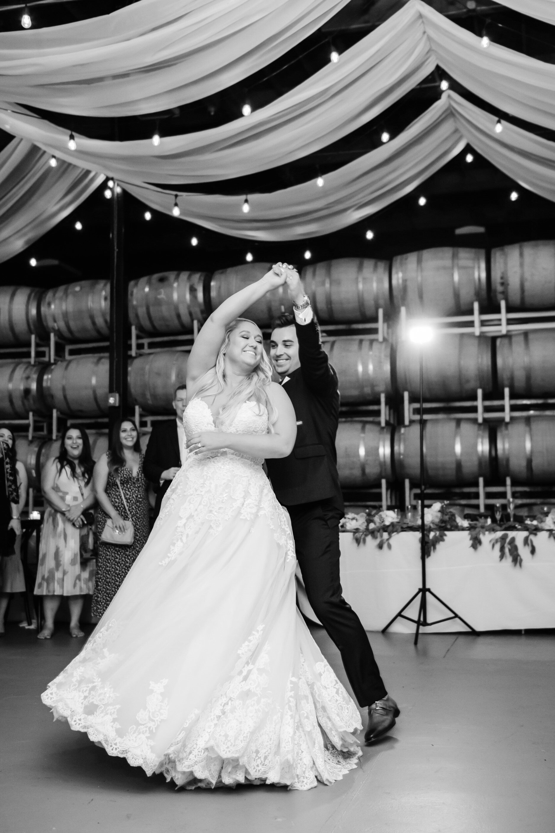 columbia-winery-barrel-room-reception-pacific-engagements-bride-and-groom-first-dance