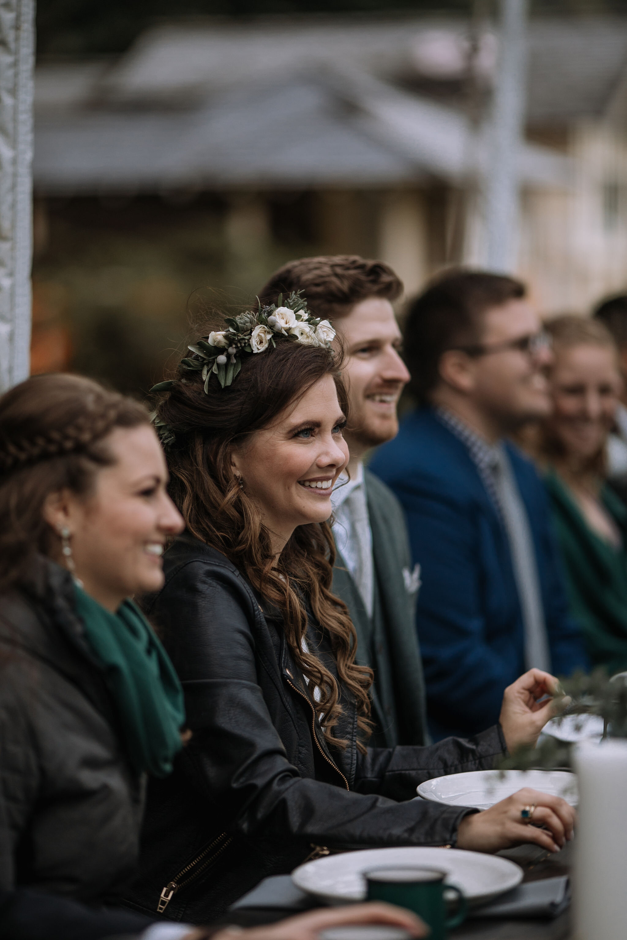 pacific-engagements-lake-crescent-lodge-wedding-reception-candid-photos-bride-and-groom-bridal-leather-jacket