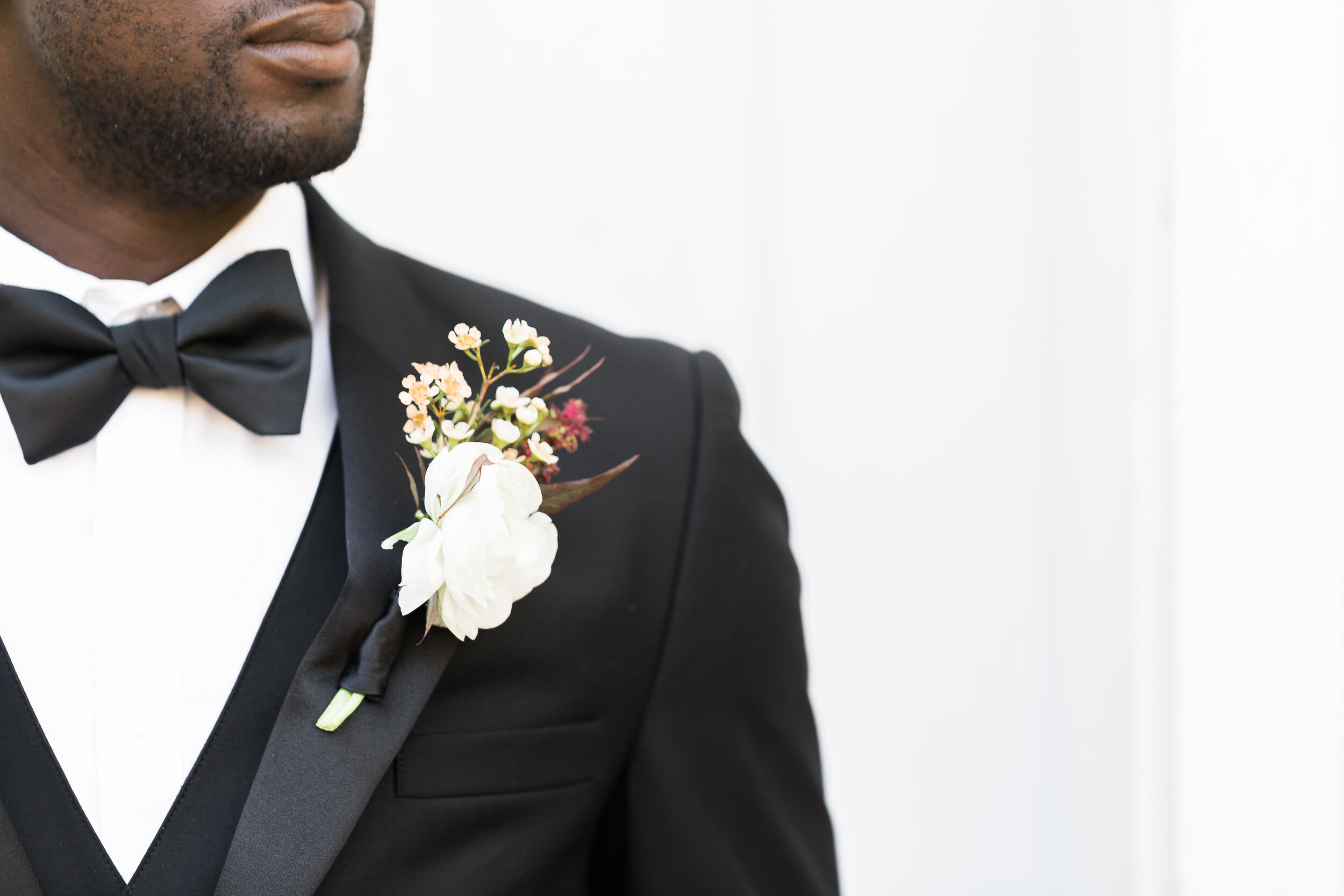 pacific-engagements-dumbarton-house-wedding-groom-getting-ready-photos-groom-boutonniere