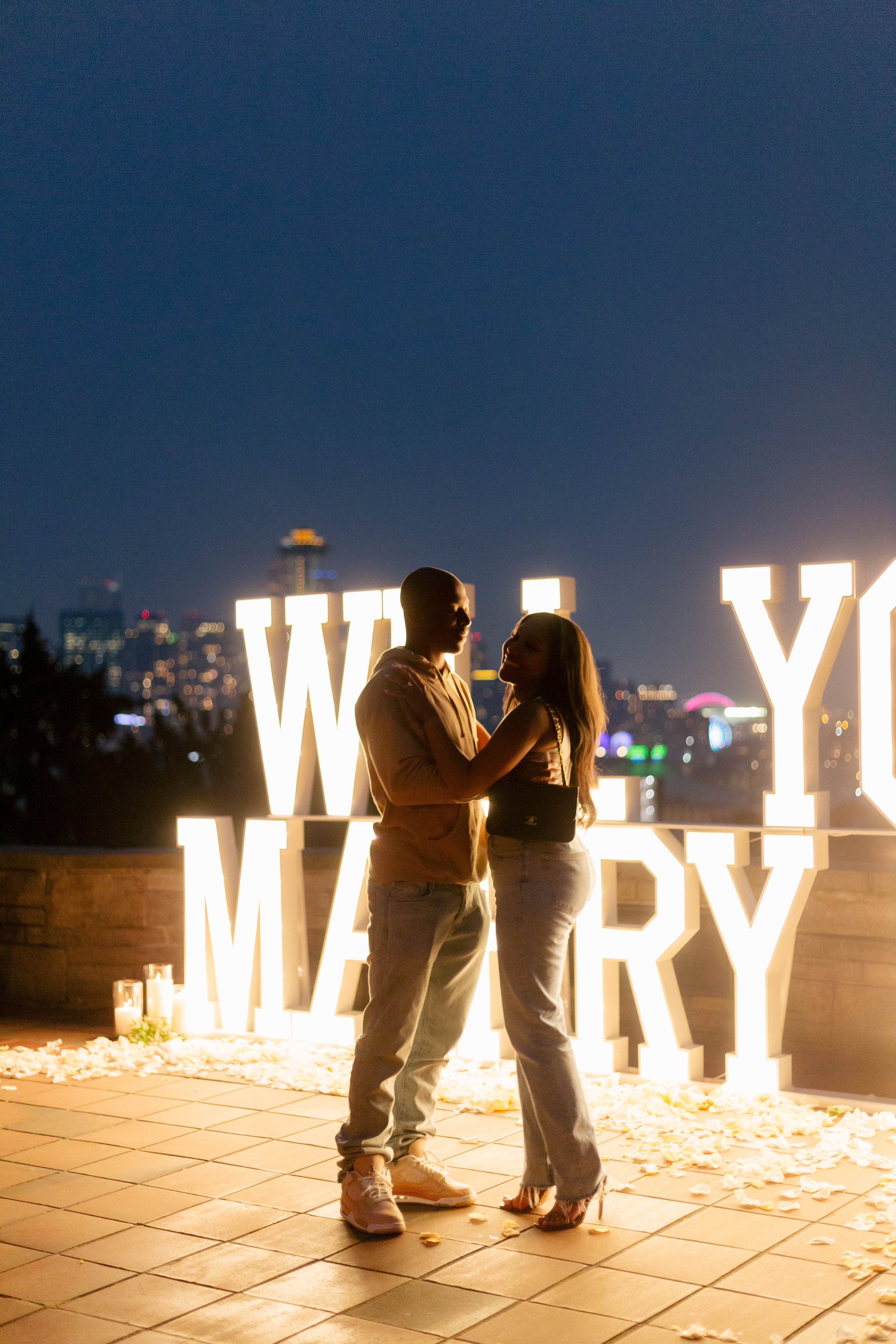 pacific-engagements-wedding-planning-and-design-seattle-seahawk-tyler-lockett-fiance-lauren-jackson-engaged-kerry-park-kerry-jeanne-photography-a-to-z-marquee-letter-rental