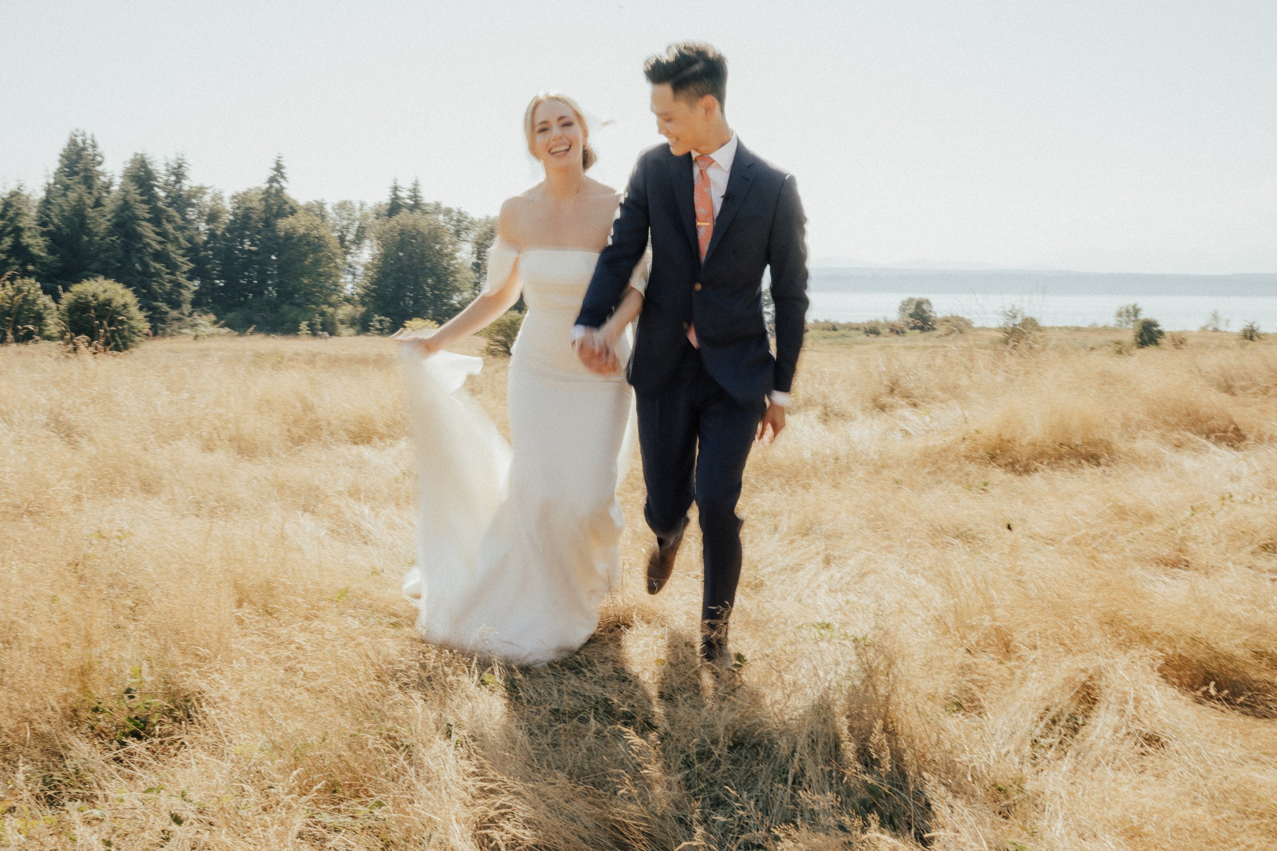 top-seattle-wedding-planner-pacific-engagements-discovery-park-wedding-portraits-bride-and-groom-blurred-portraits-rachel-syrisko-photography