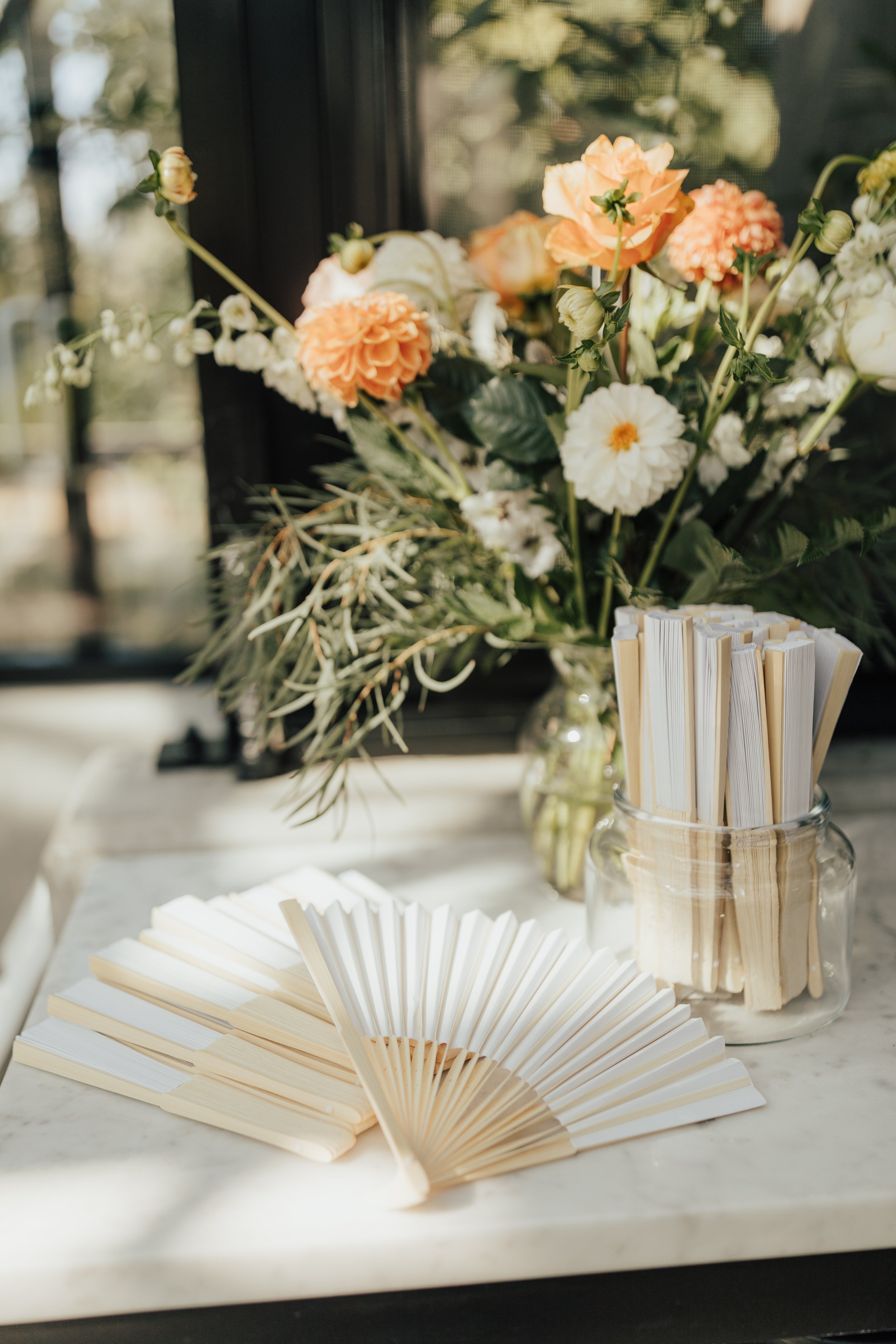 pacific-engagements-wedding-at-almquist-winery-wedding-venue-seattle-wedding-paper-fan-favors