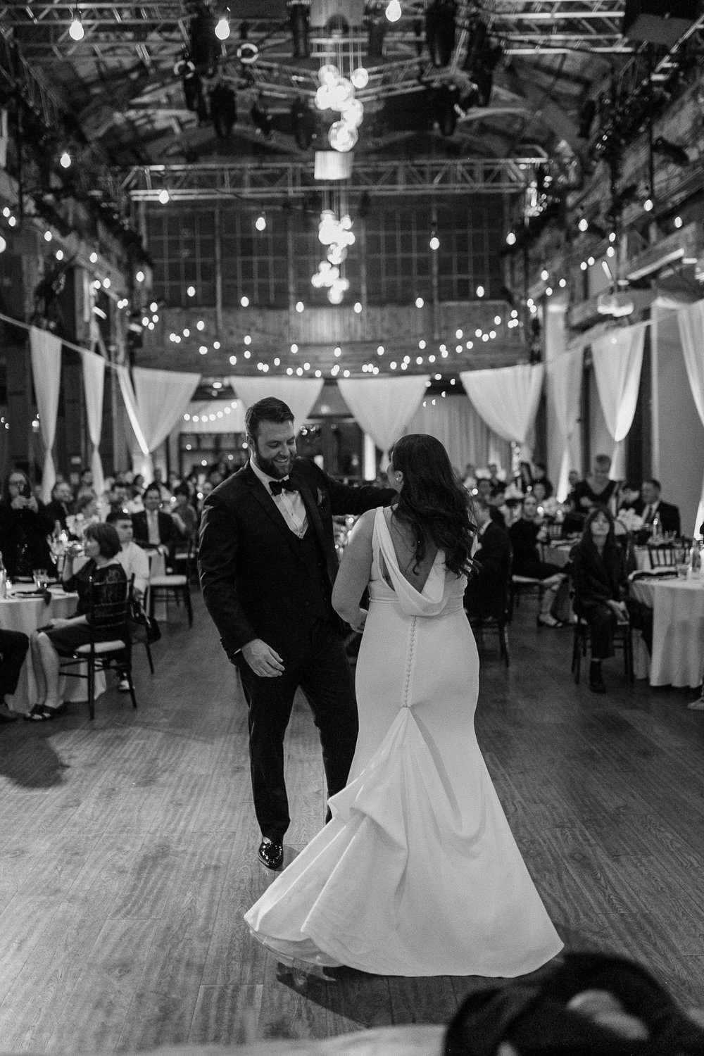sodo-park-wedding-reception-first-dance-seattle-wedding-planner-pacific-engagements-tonie-christine-photography