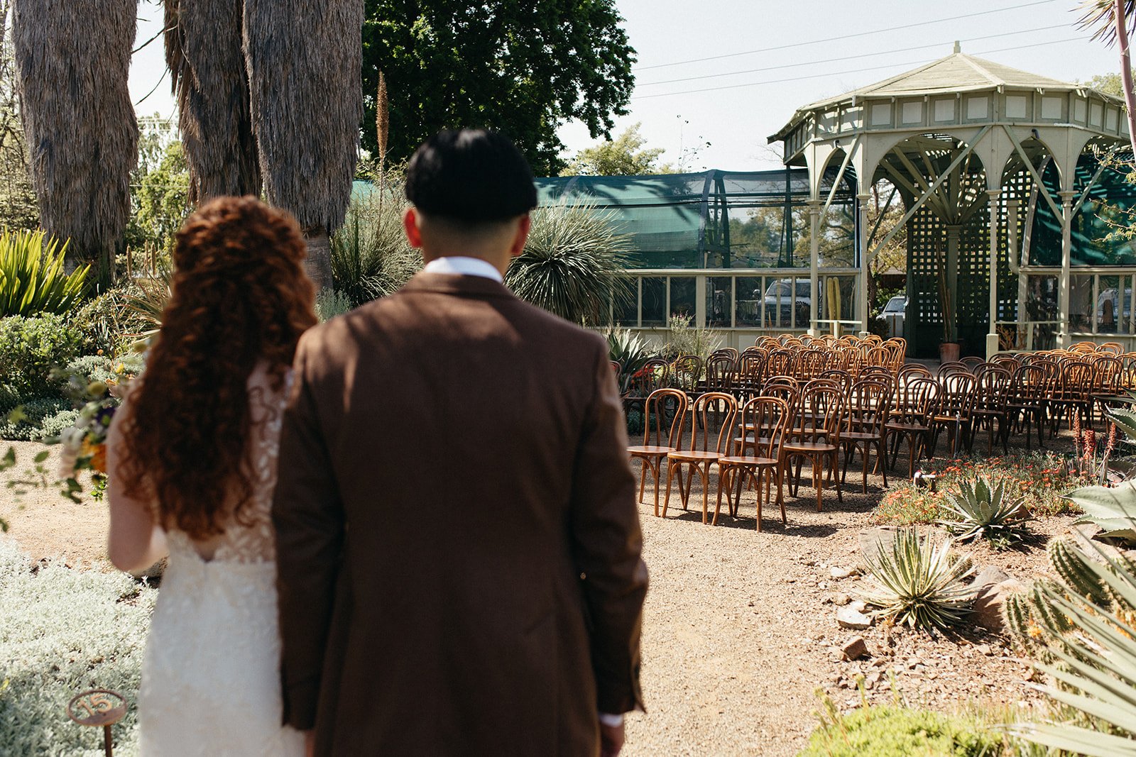 pacific-engagements-ruth-bancroft-gardens-wedding-ceremony-set-up-bentwood-chairs-wood-sam-minter-photography