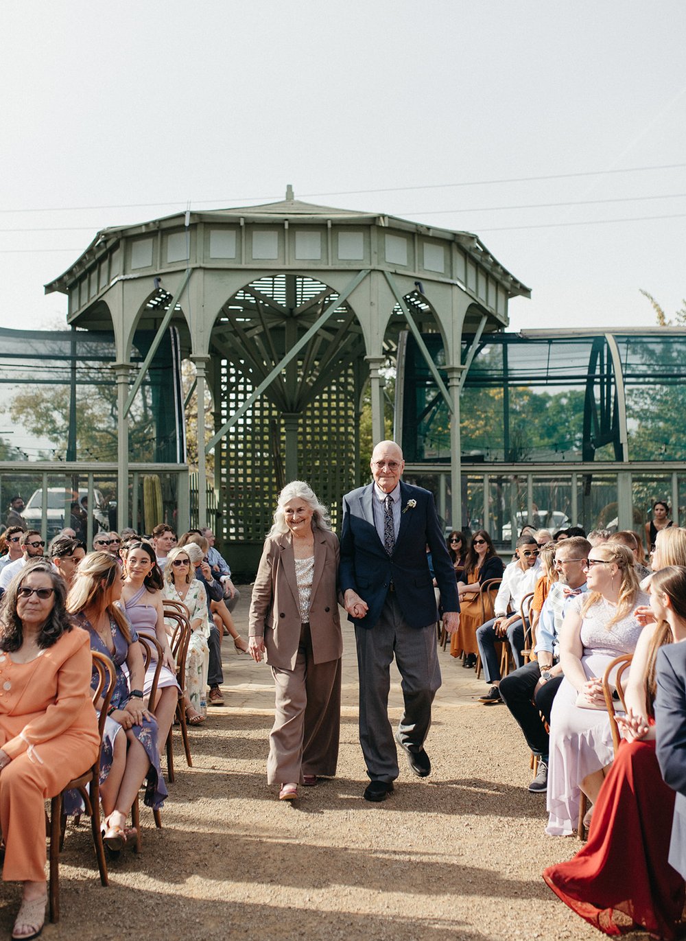 pacific-engagements-ruth-bancroft-gardens-wedding-photos-of-grandparents-walking-down-ceremony-aisle-sam-minter-photography