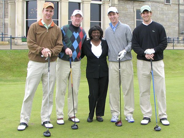  Renee Powell with famous football family, The Manning's in front of R &amp; A in Scotland.&nbsp; 